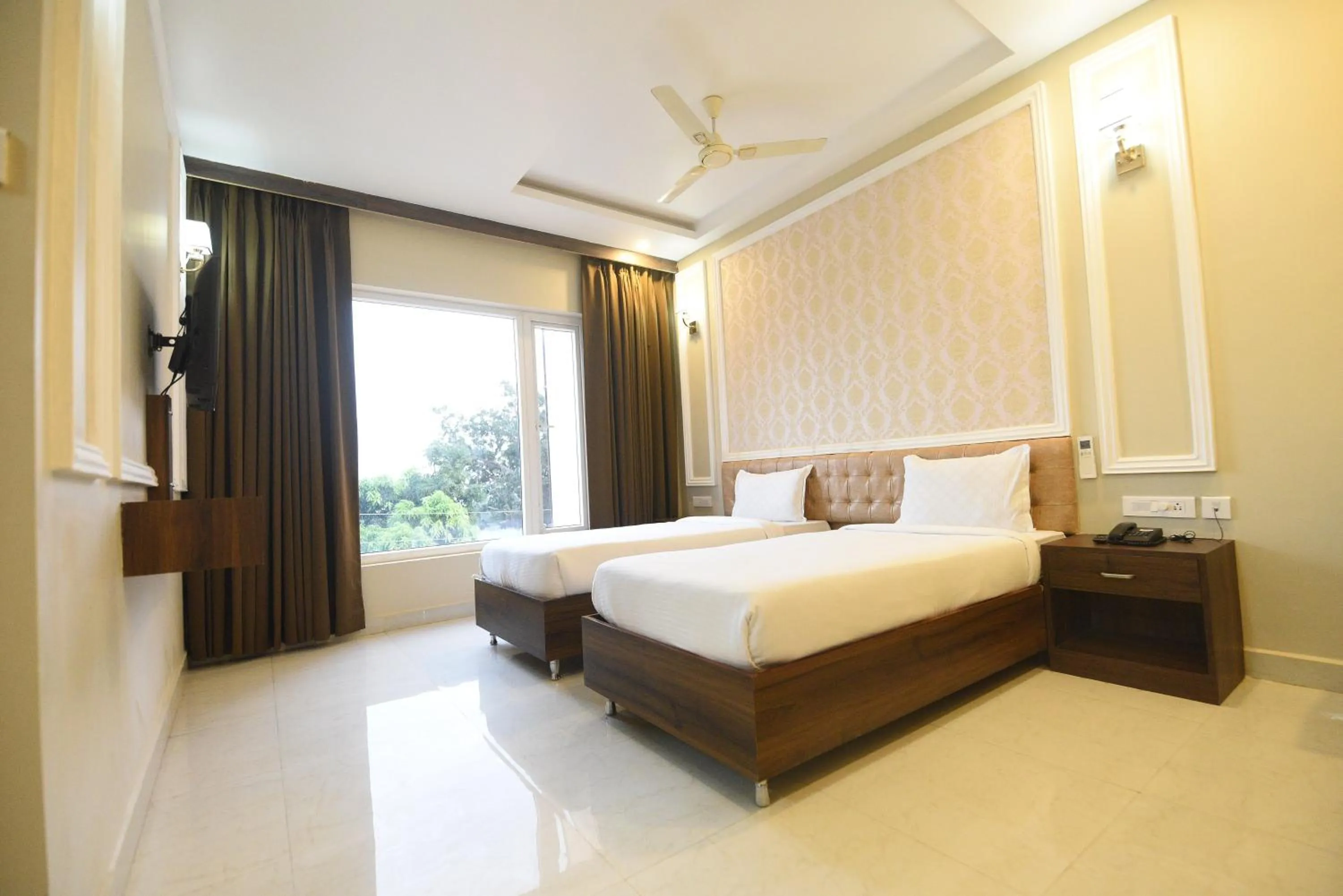Bed in Hotel Nilay Residency