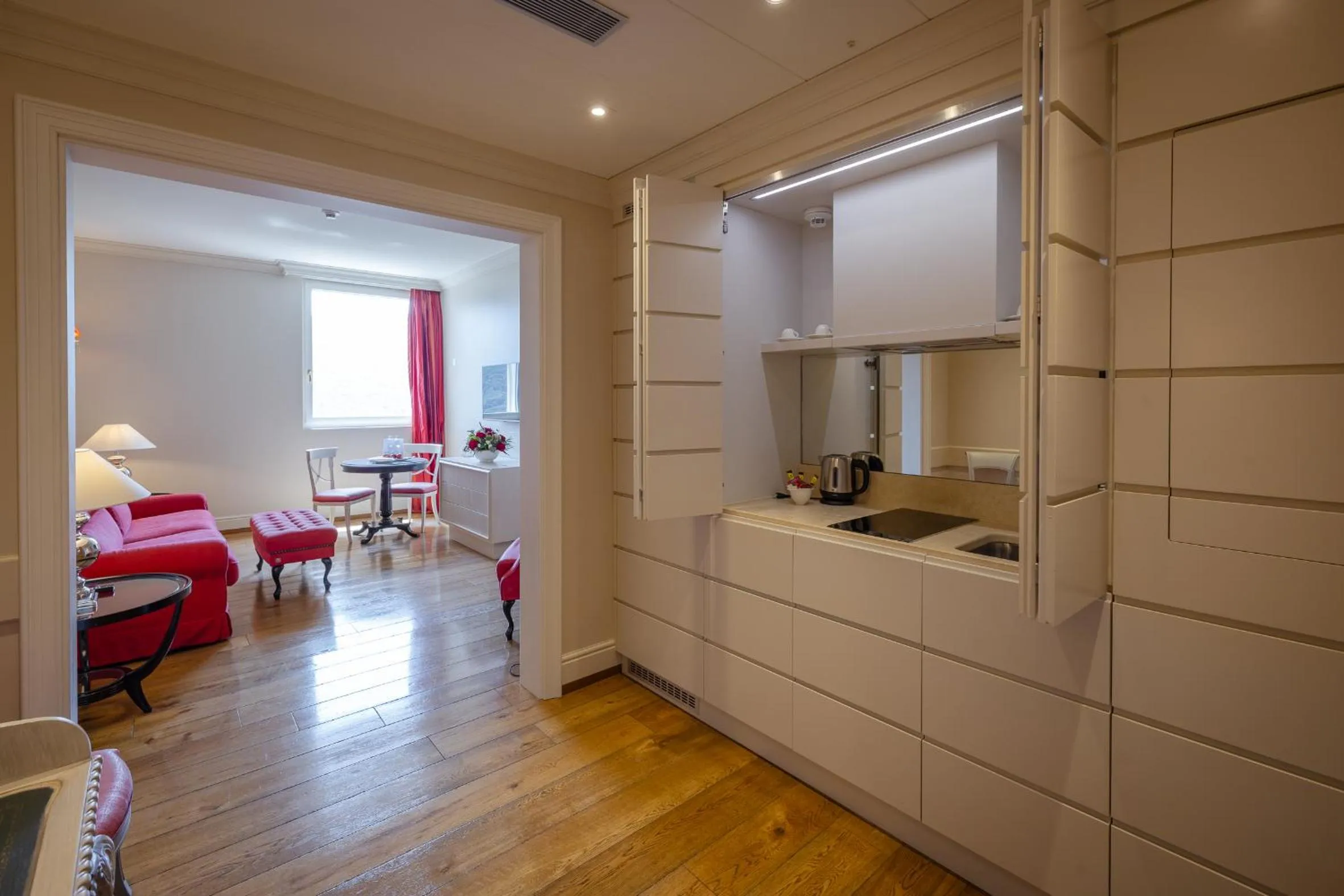 Kitchen or kitchenette, Bed in Resort Collina d'Oro - Hotel, Residence & Spa