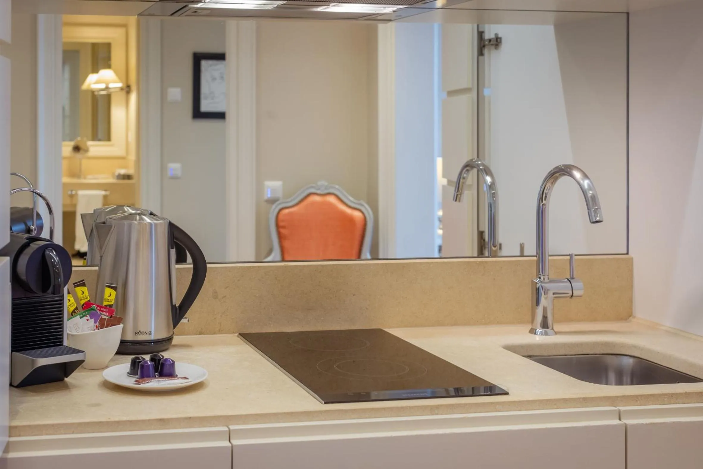 Kitchen or kitchenette in Resort Collina d'Oro - Hotel, Residence & Spa