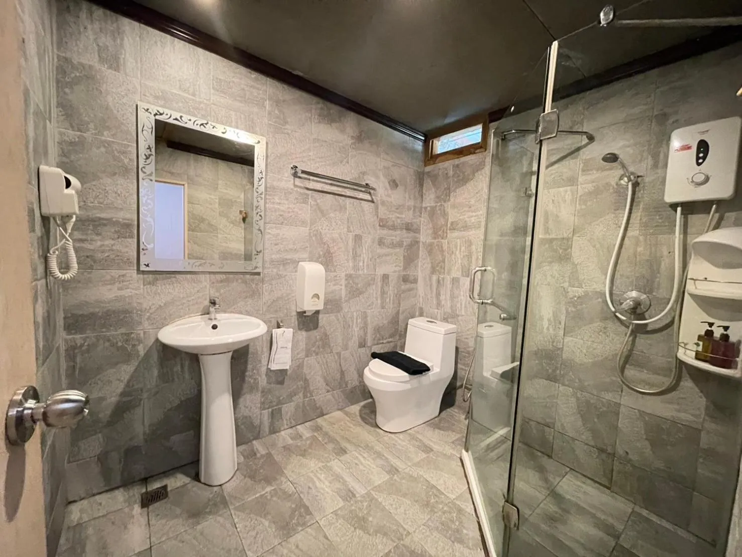 Shower in The Hub Erawan Resort