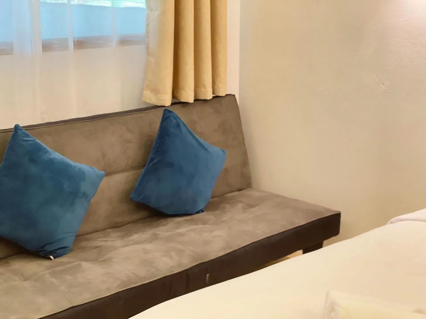 Living room, Bed in The Hub Erawan Resort