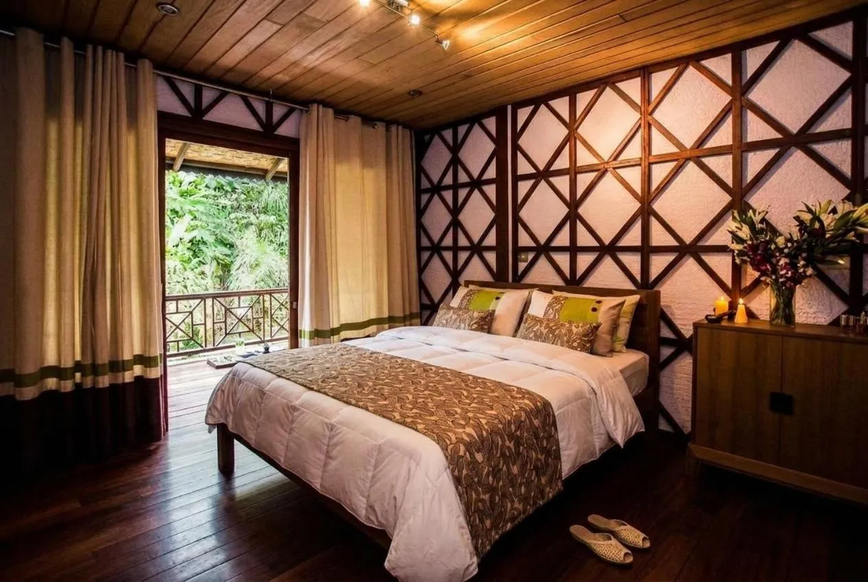 Bed in ViewPoint Ecolodge