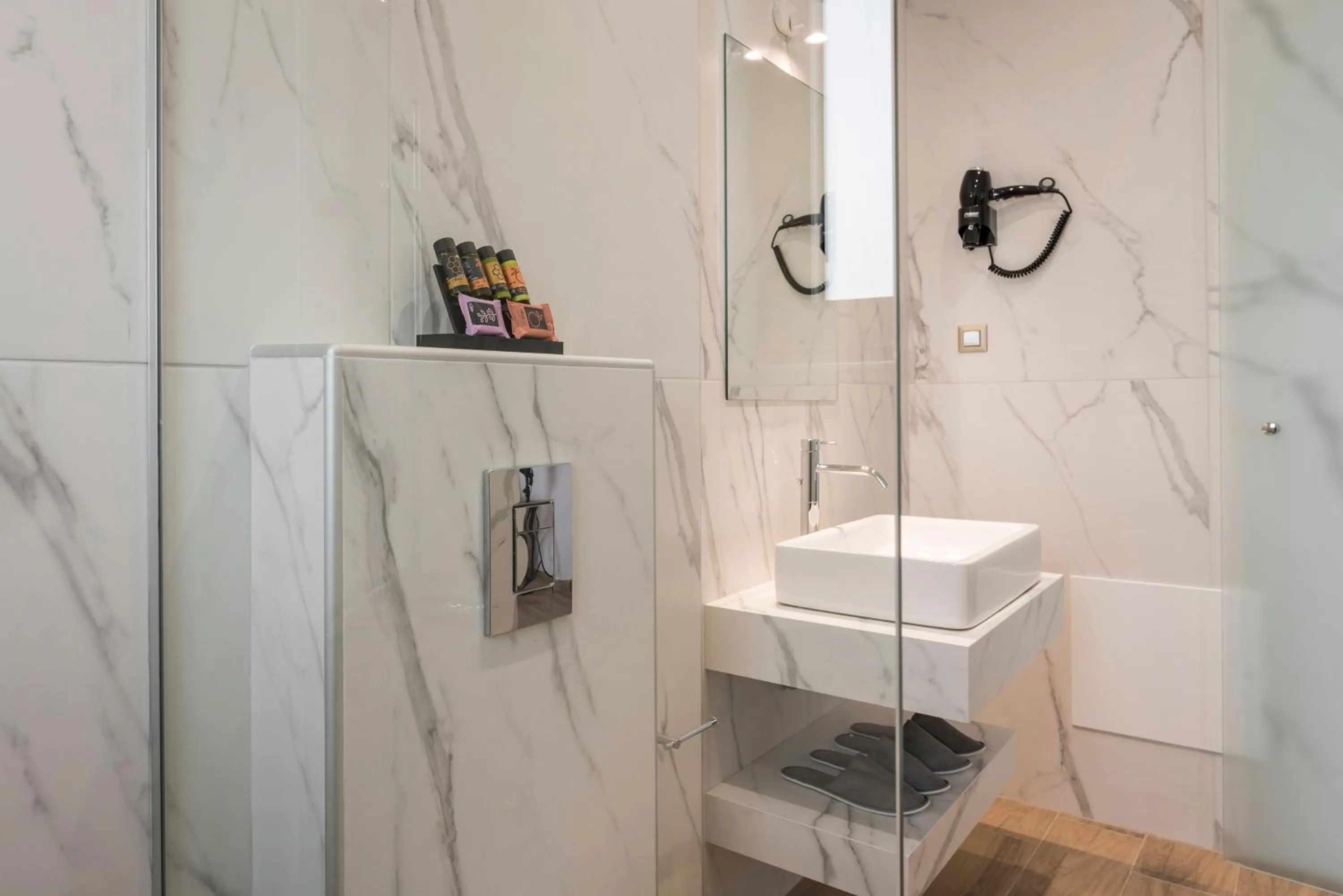 Shower in Aequor Luxury Rooms & Apartments