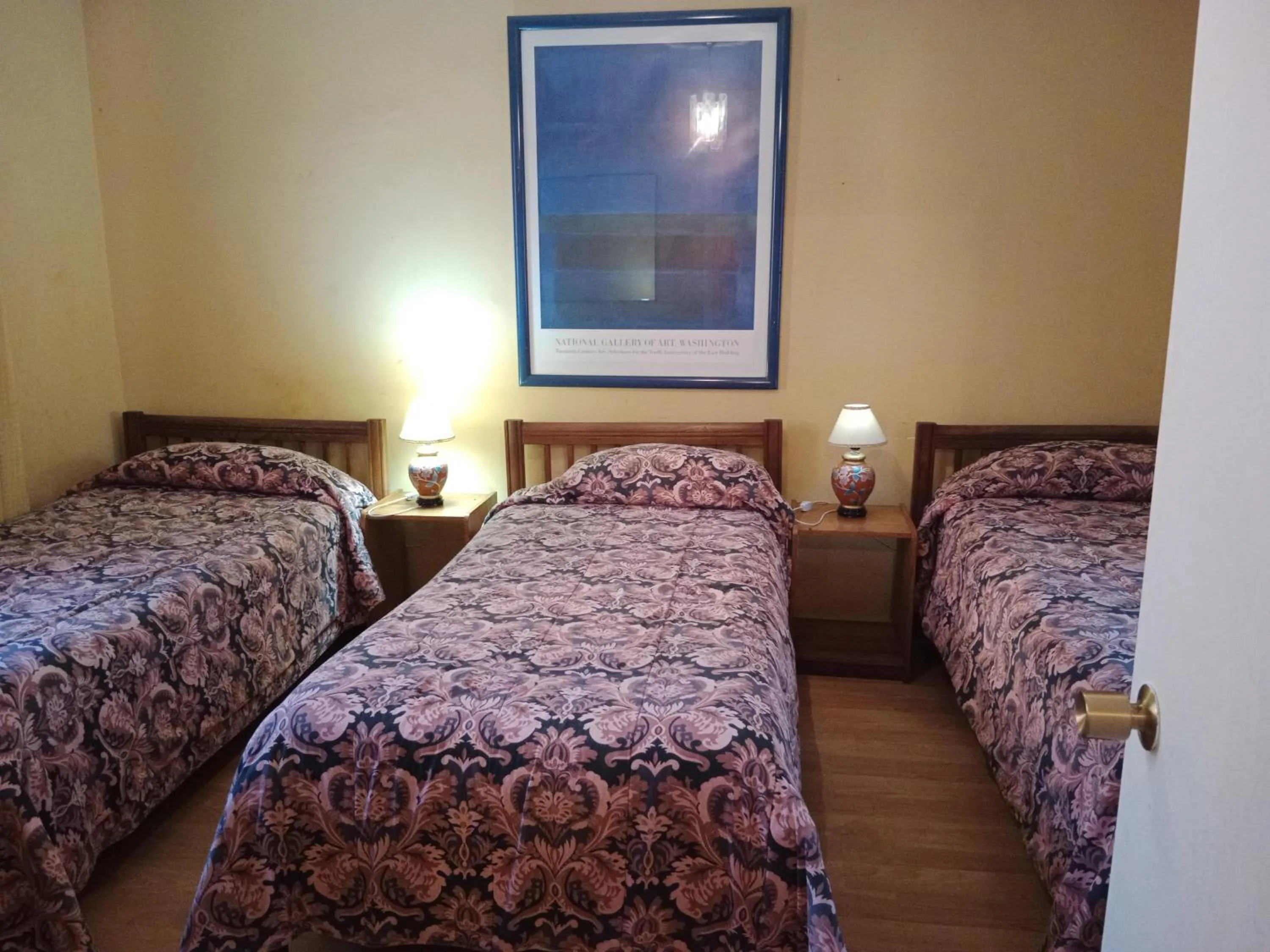 Bed in Aquamarina Apart Hotel