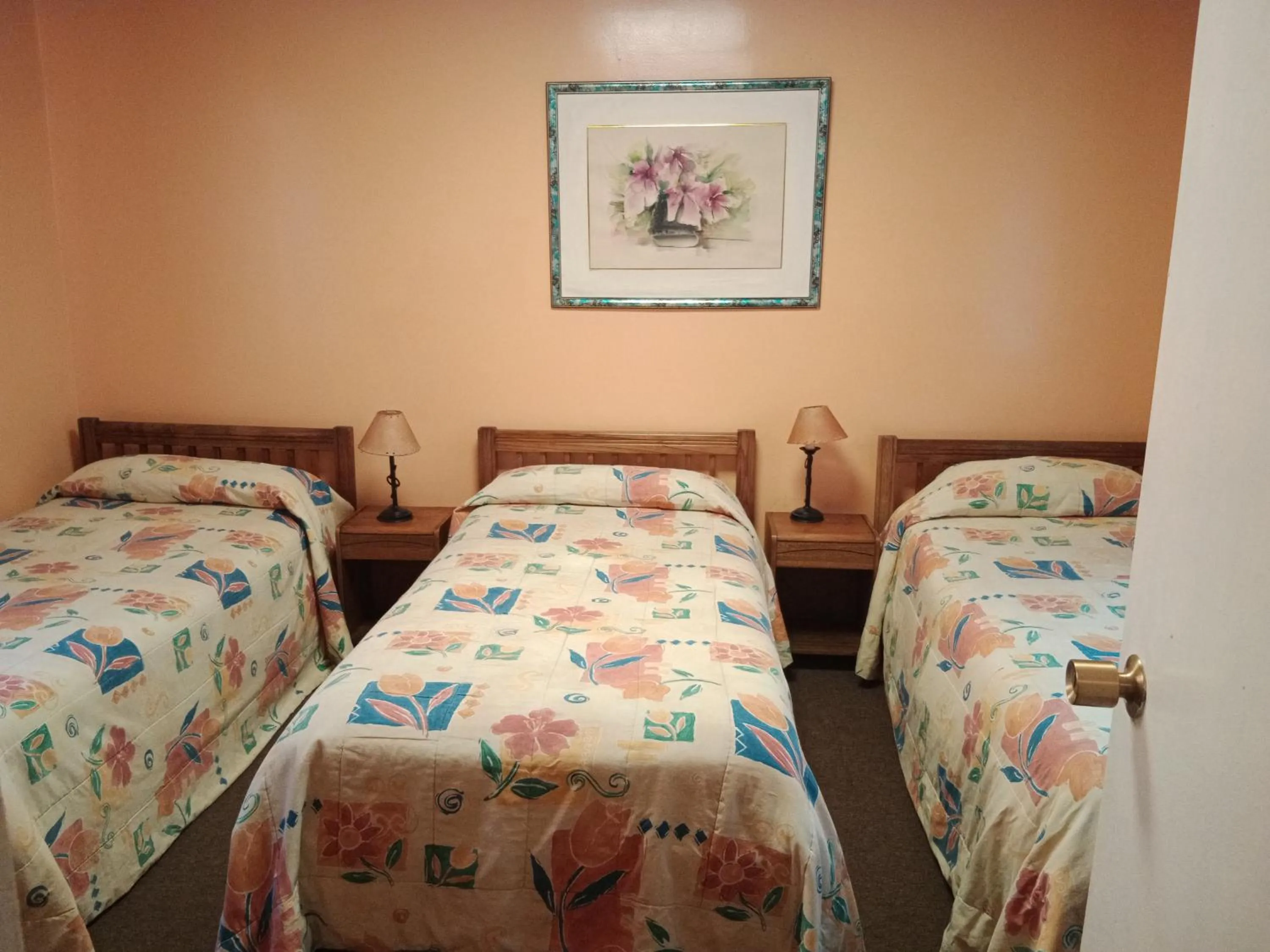 Bed in Aquamarina Apart Hotel