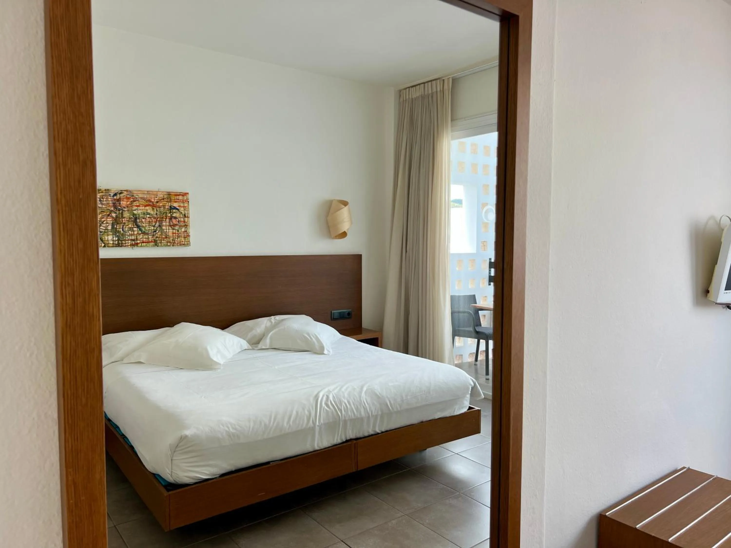 Bed in Es Mitjorn Hotel