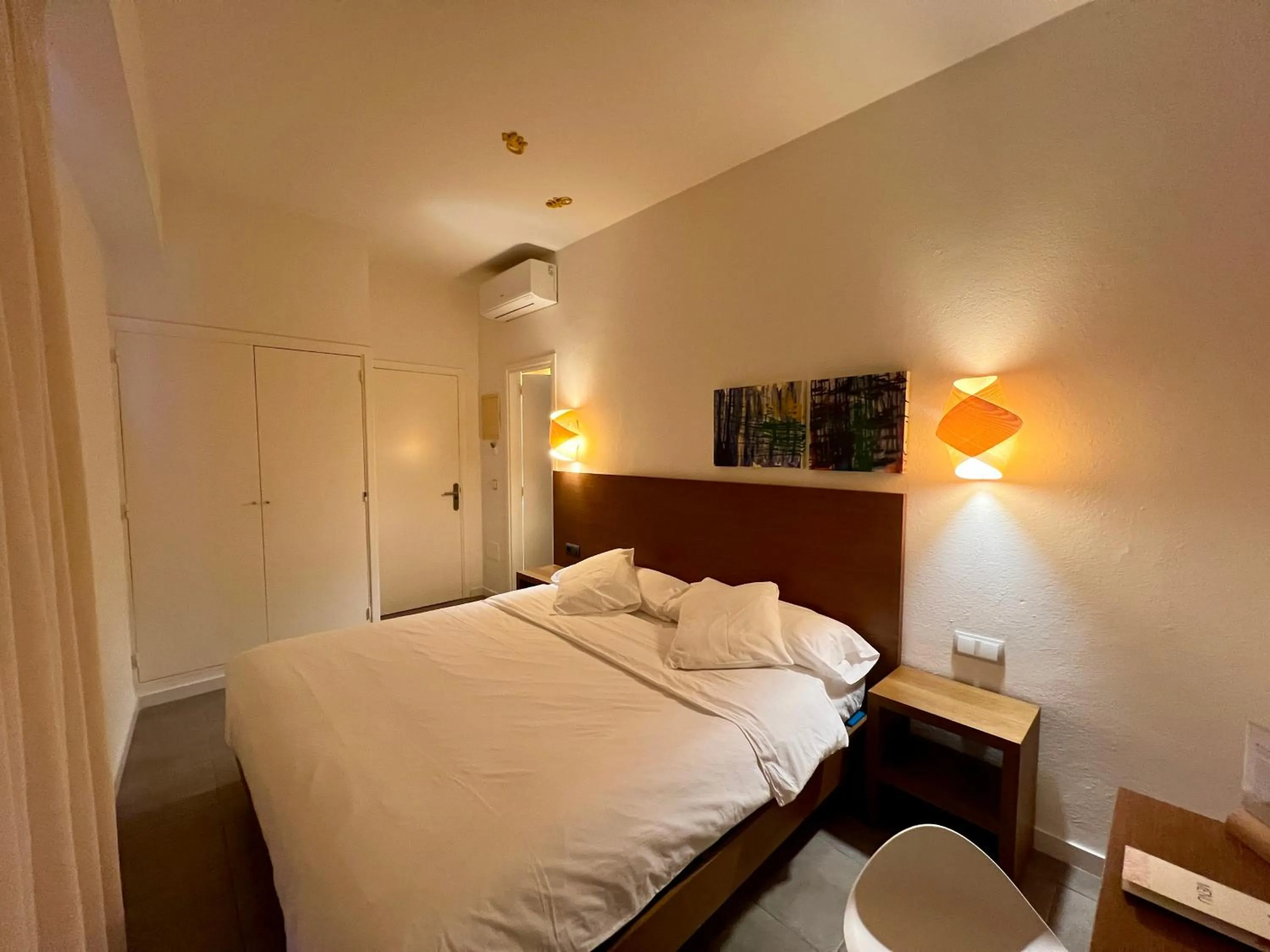 Bed in Es Mitjorn Hotel