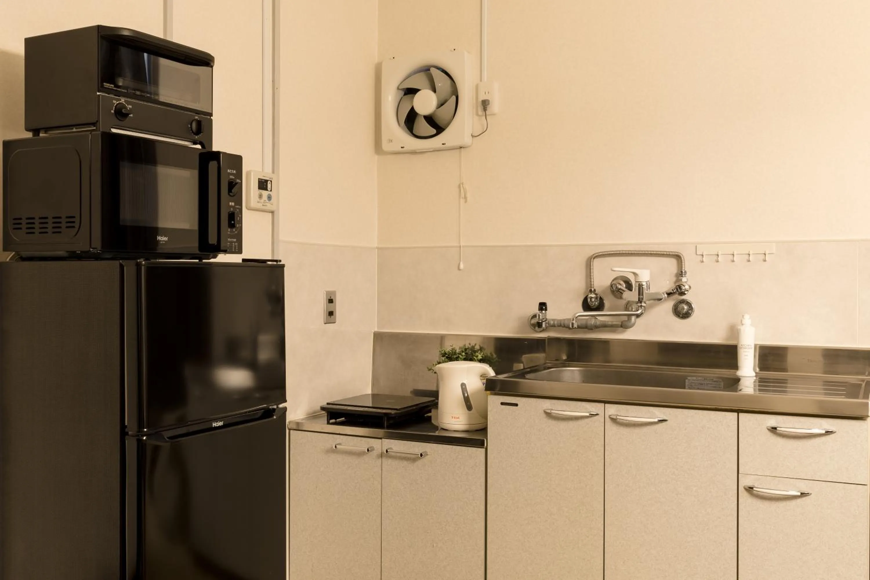 Kitchen or kitchenette in Fuji Heights Hotel