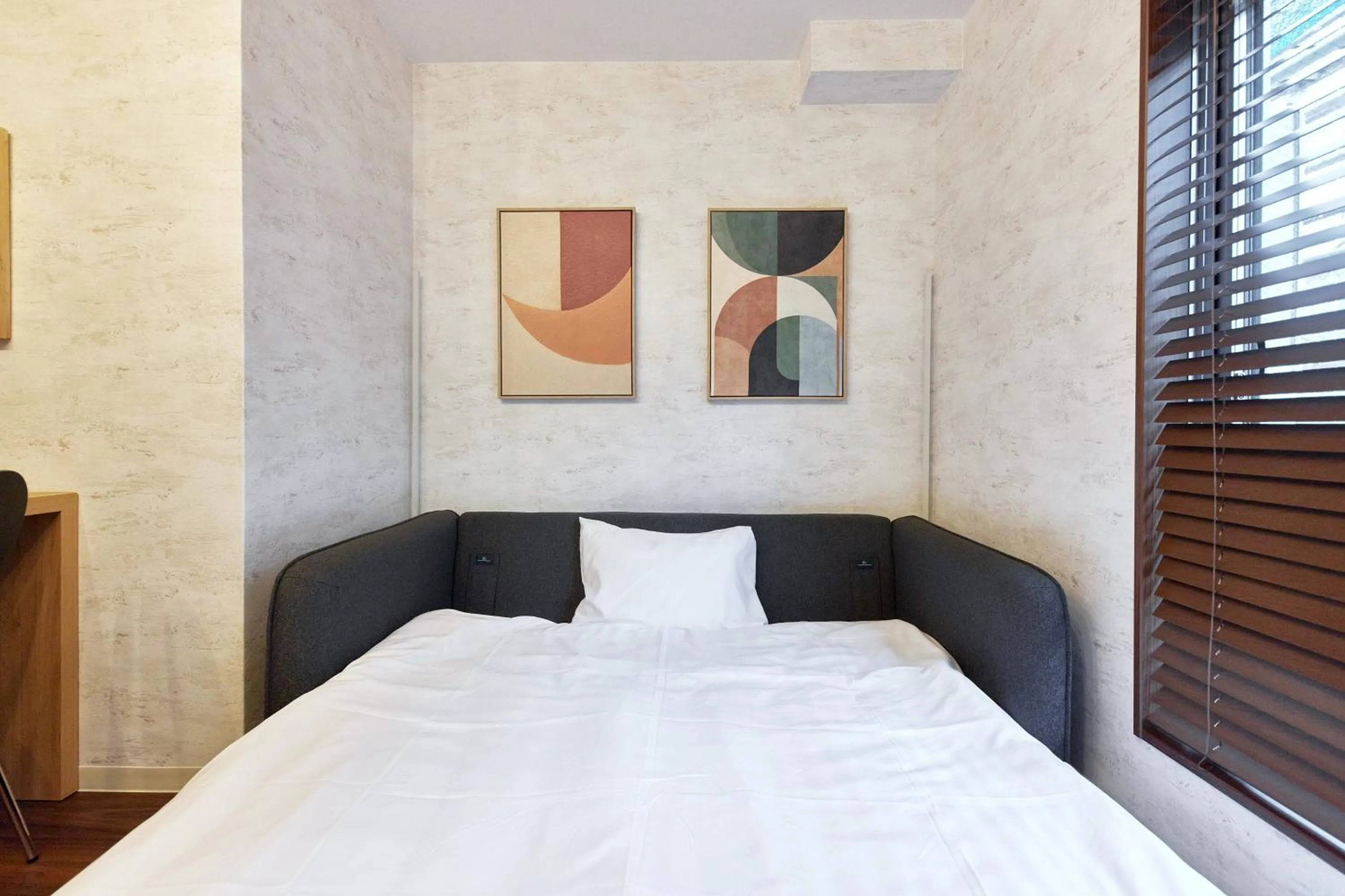 Bed in Fuji Heights Hotel