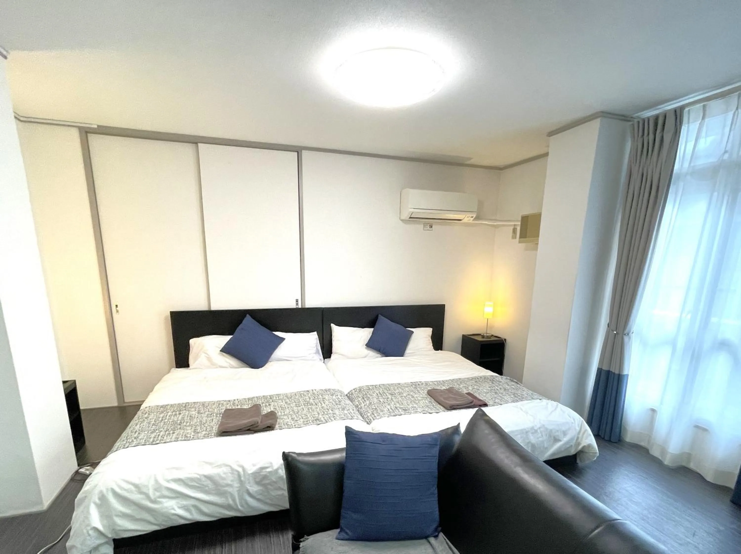 Bed in Fuji Heights Hotel