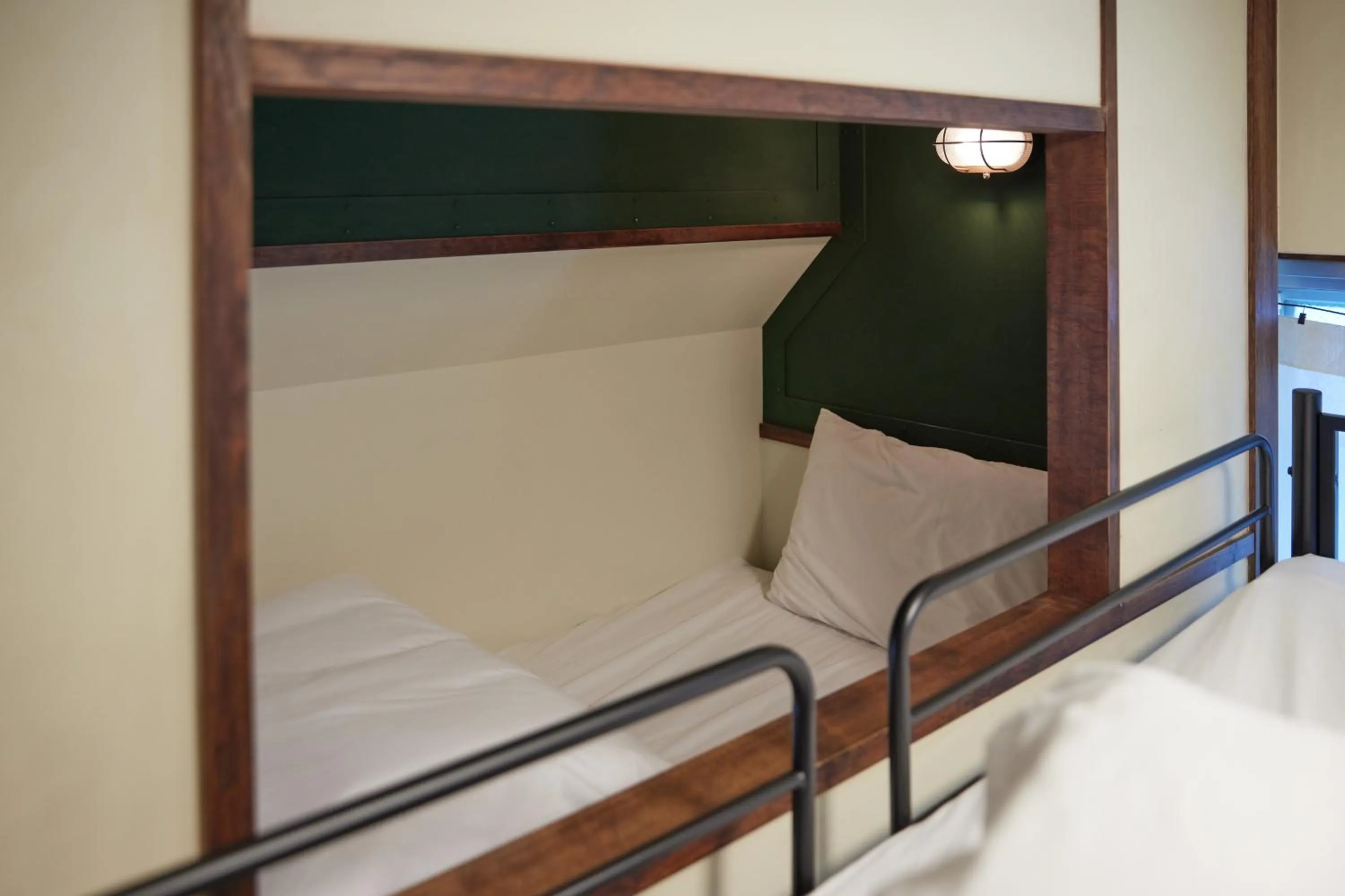 Bed in Fuji Heights Hotel