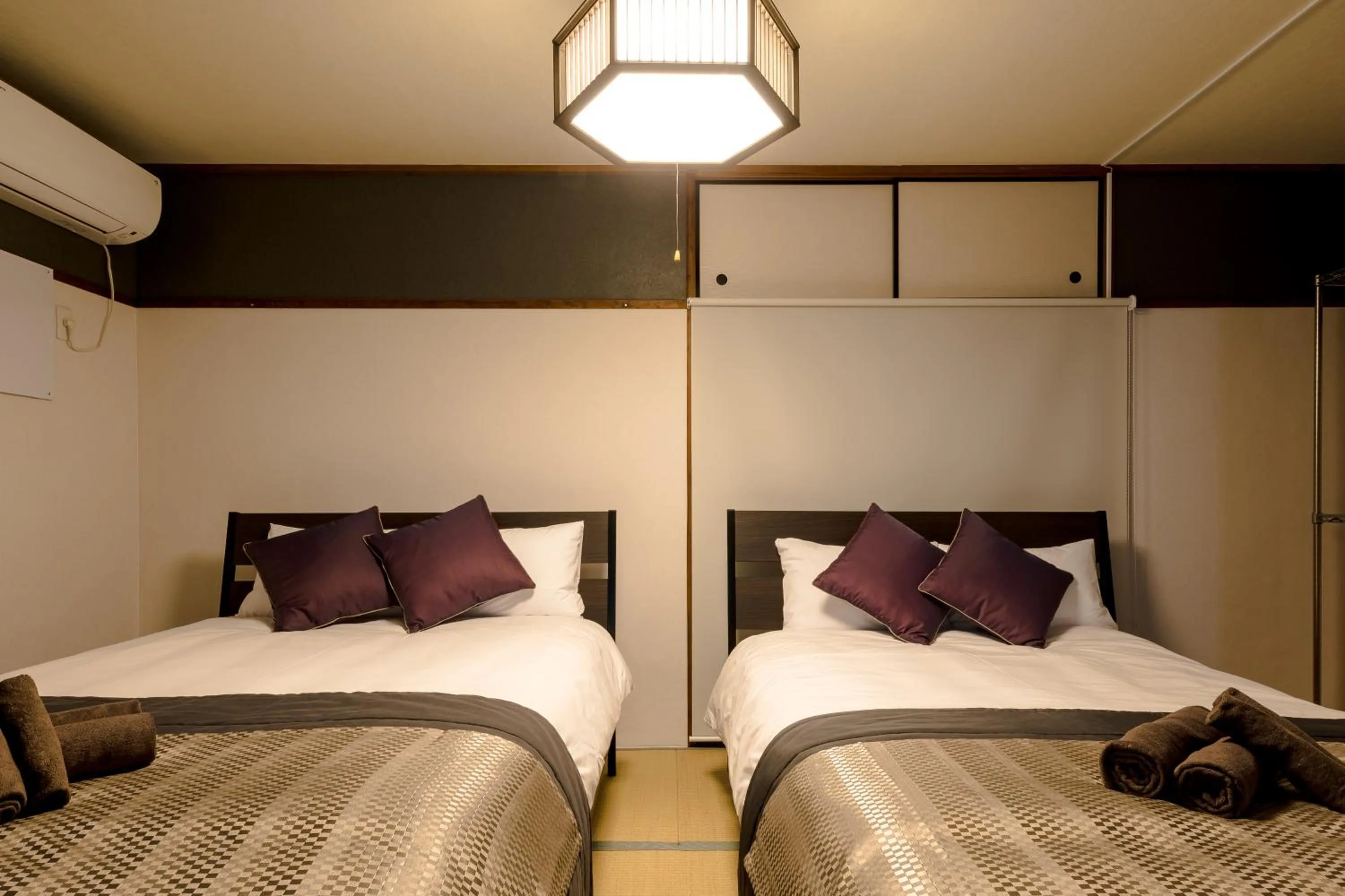 Bed in Fuji Heights Hotel