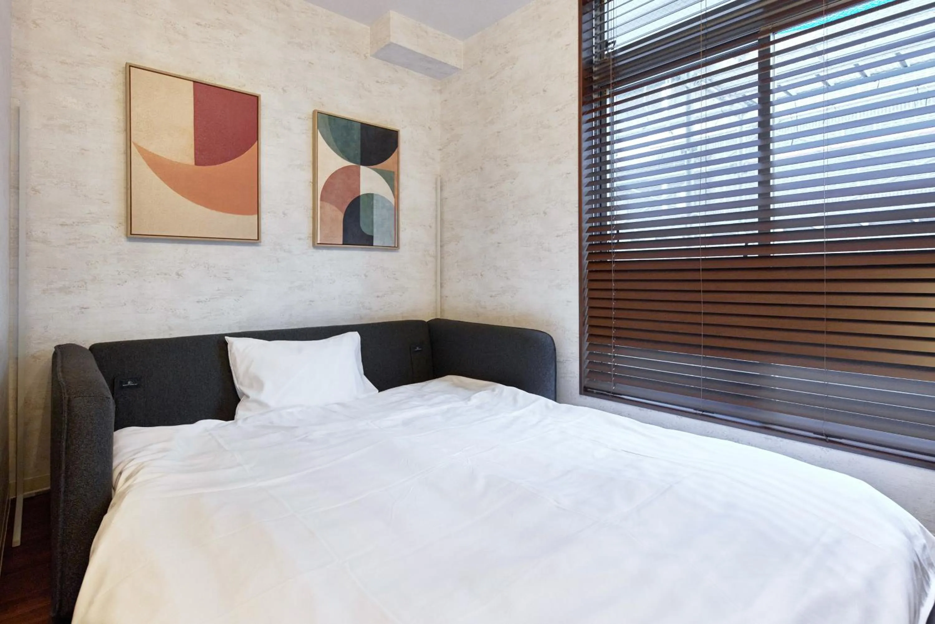 Bed in Fuji Heights Hotel