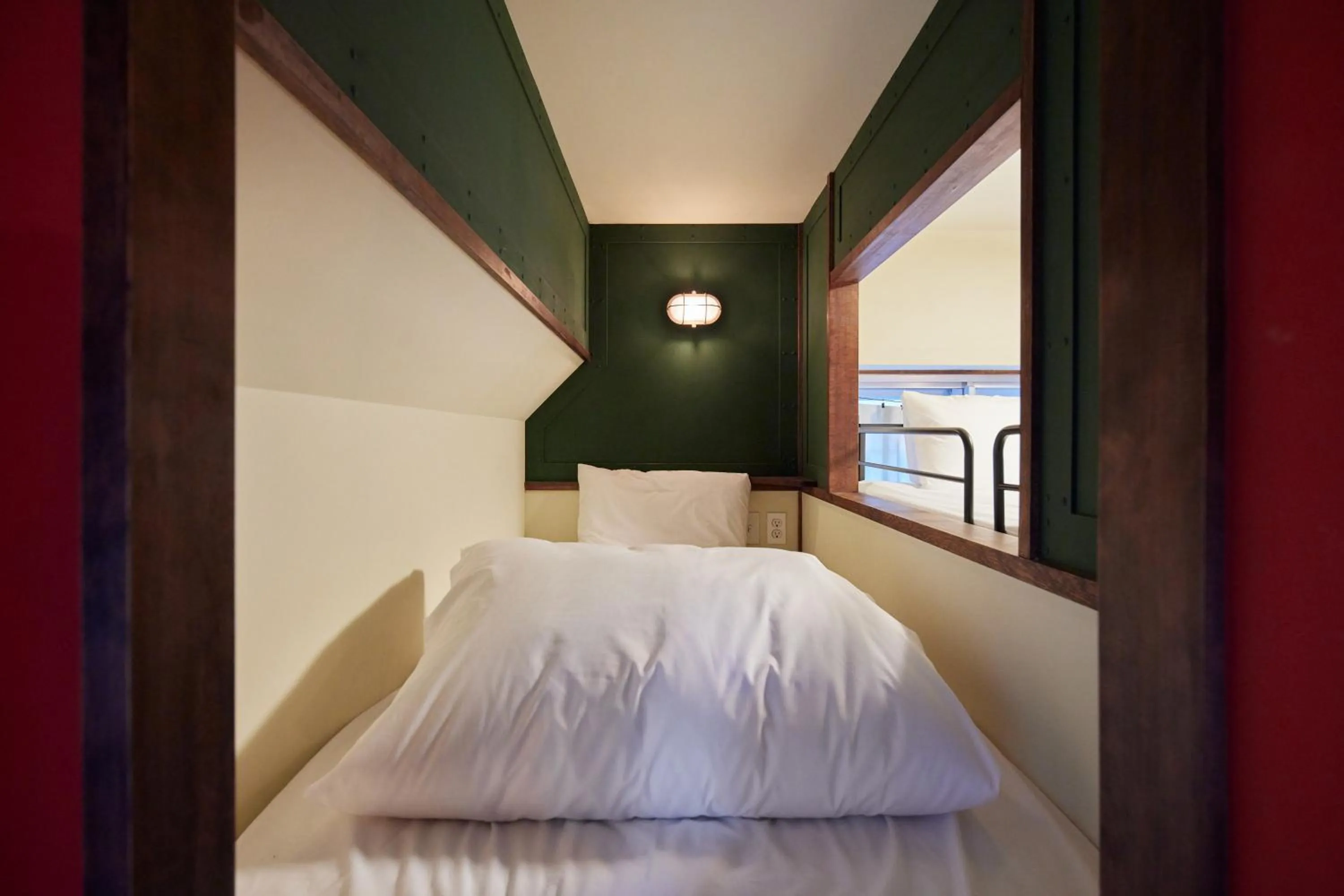 Bed in Fuji Heights Hotel