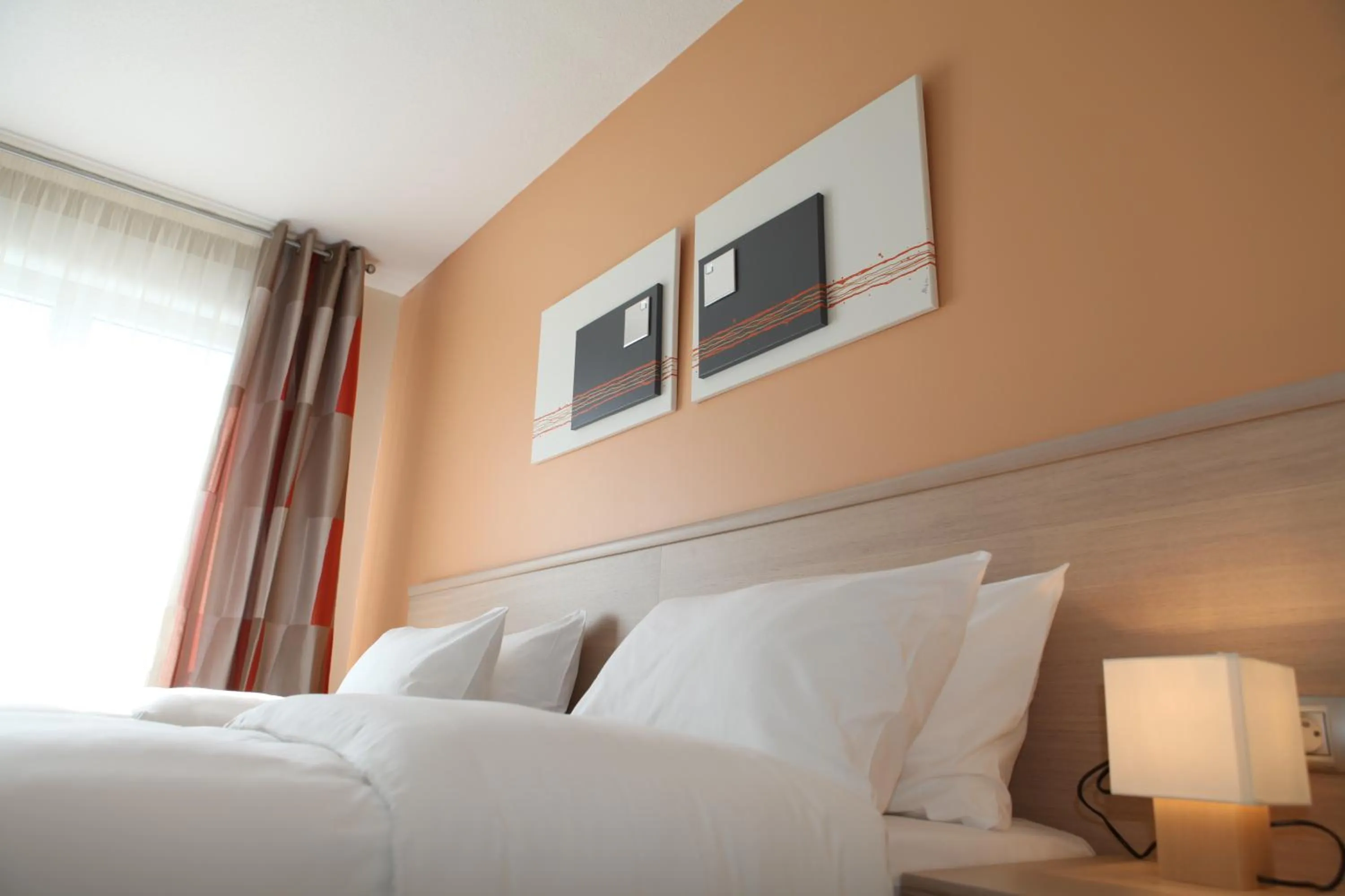 Decorative detail, Bed in The Originals Boutique, Hotel l'Occitan, Aubagne