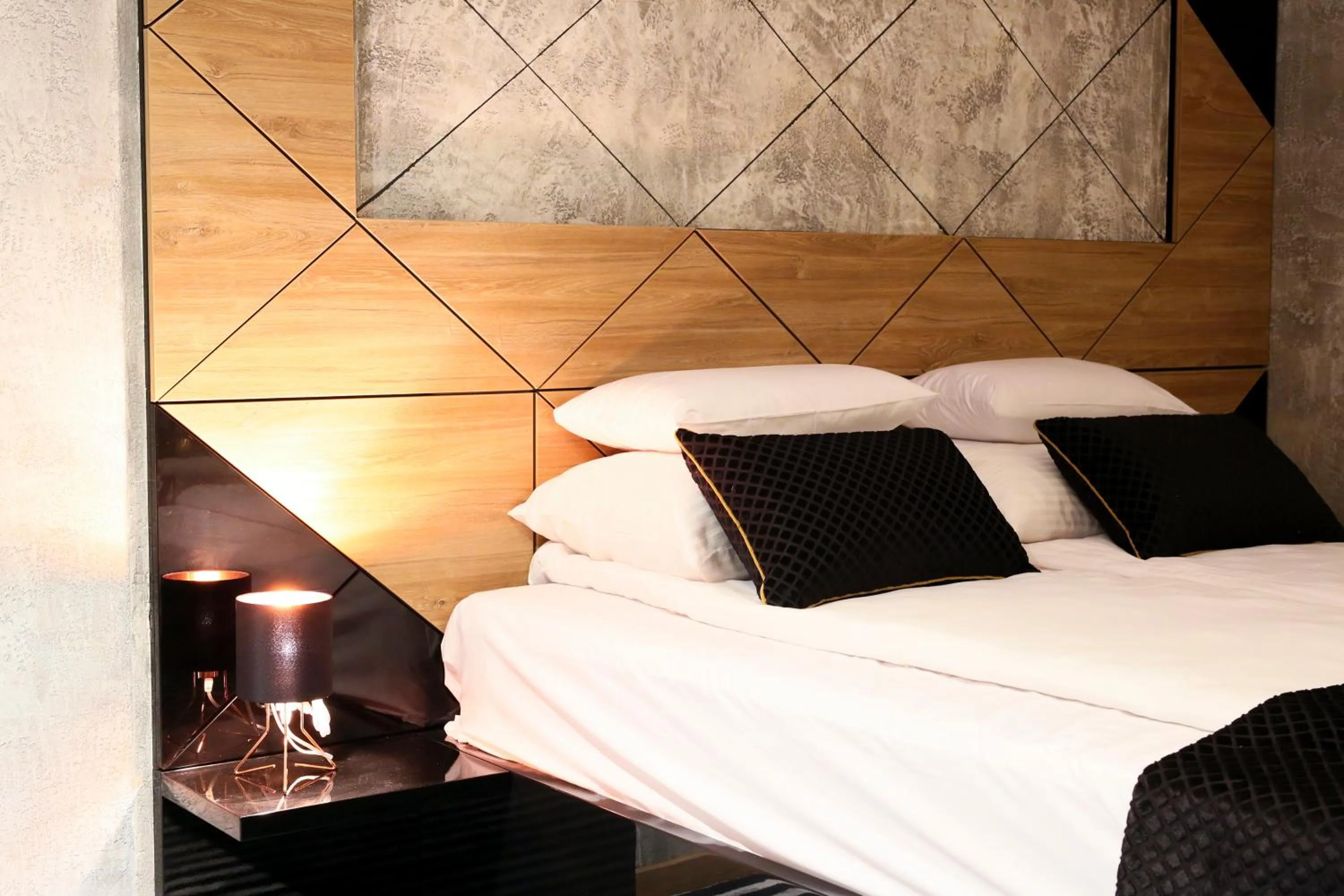 Bed in Carpe Diem Boutique Hotel