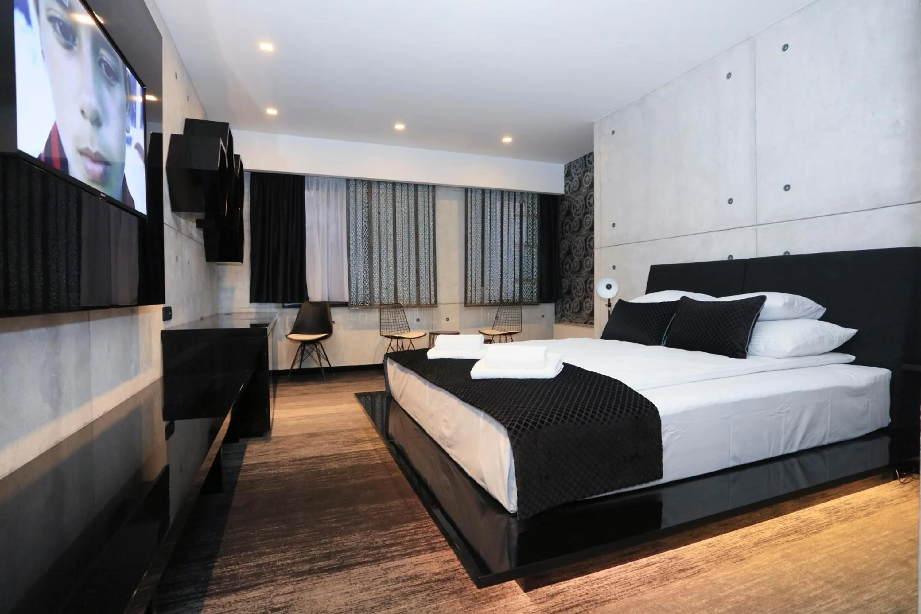 Bed in Carpe Diem Boutique Hotel