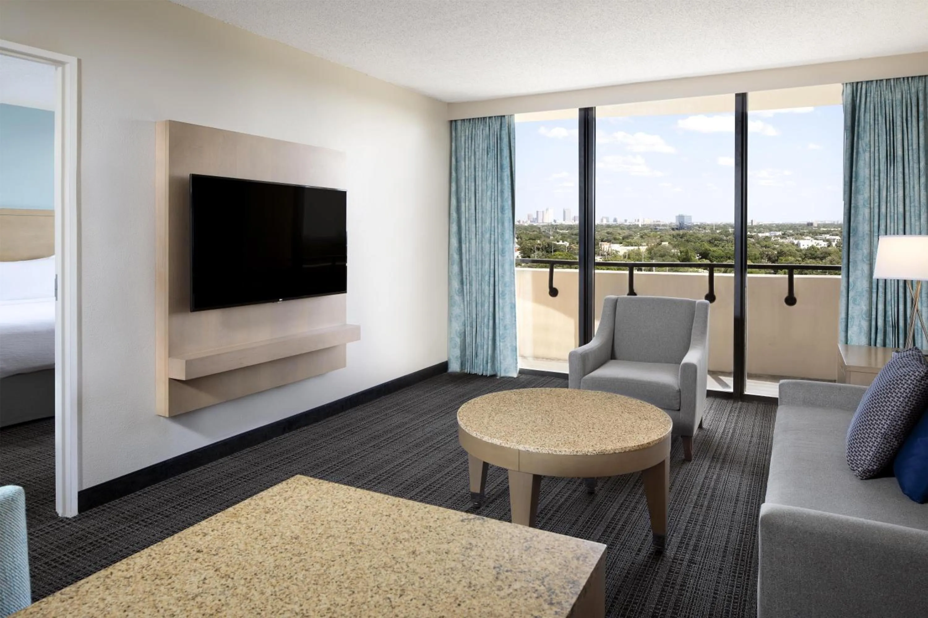 Living room, Bed in Embassy Suites by Hilton Tampa Airport Westshore
