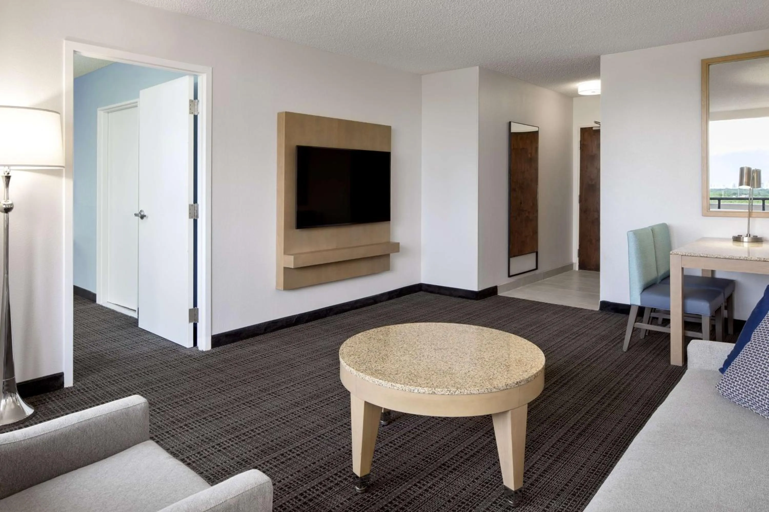 Living room in Embassy Suites by Hilton Tampa Airport Westshore