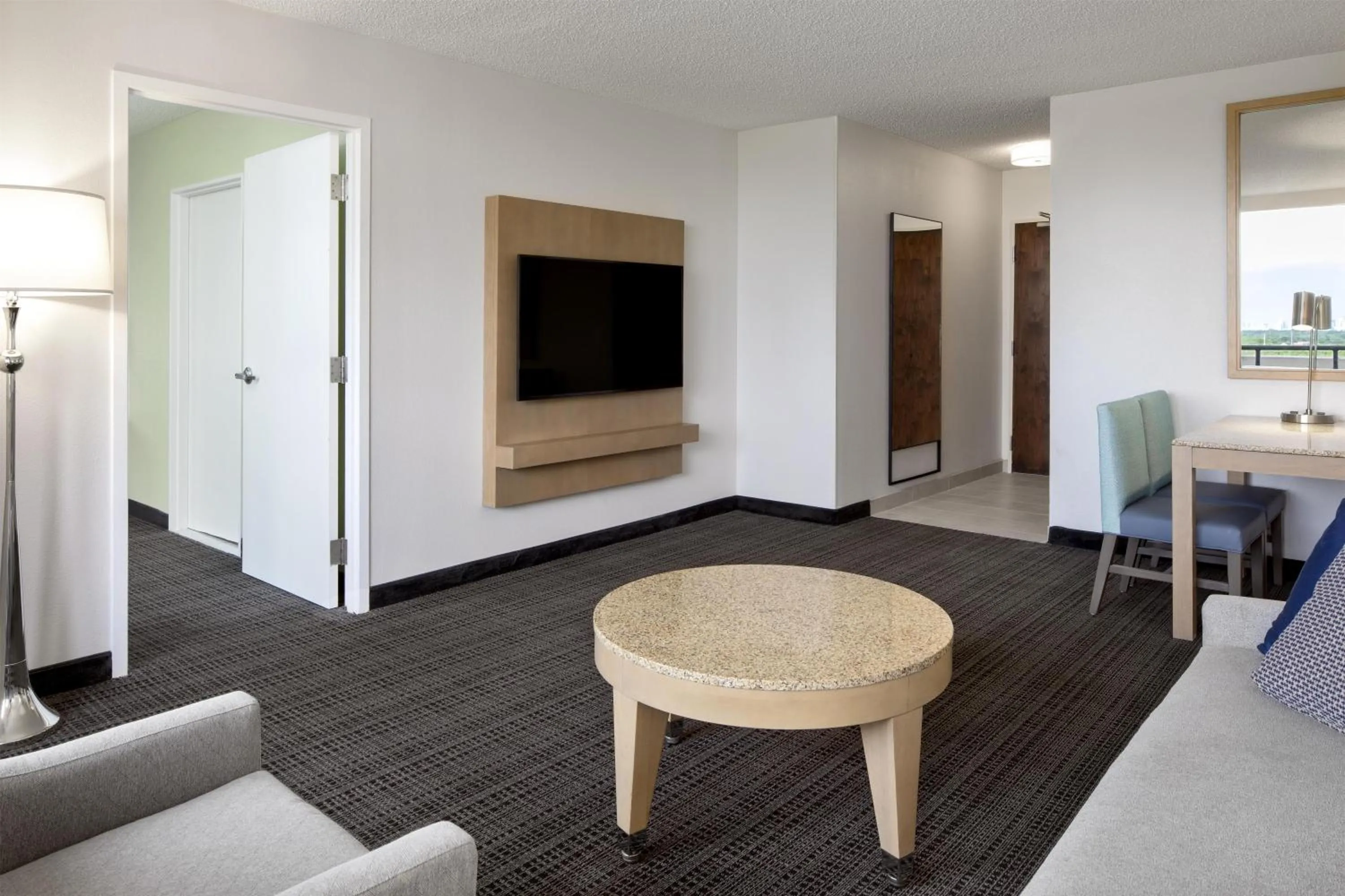 Living room in Embassy Suites by Hilton Tampa Airport Westshore