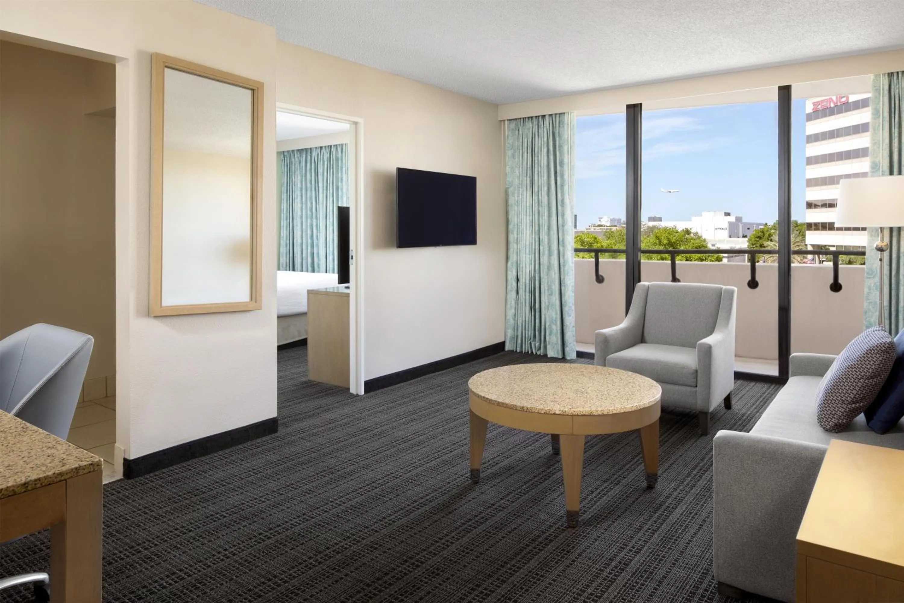 Living room in Embassy Suites by Hilton Tampa Airport Westshore