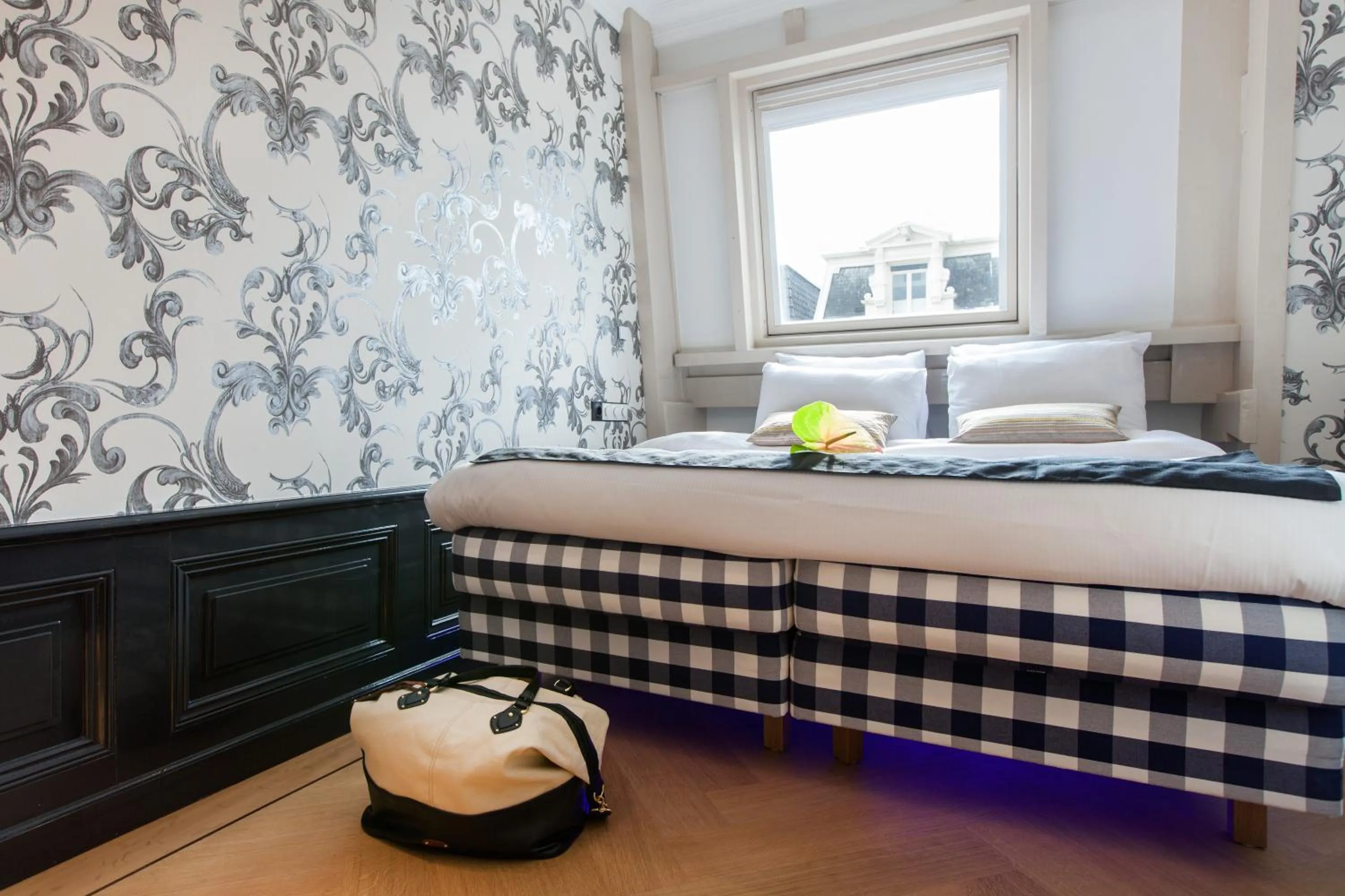 Bed in Amsterdam Canal Hotel