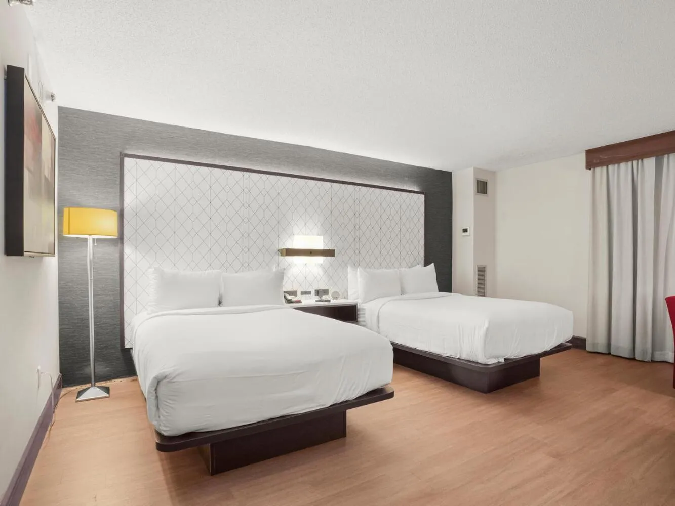 Bed in The Armon Stamford Hotel & Conference Center