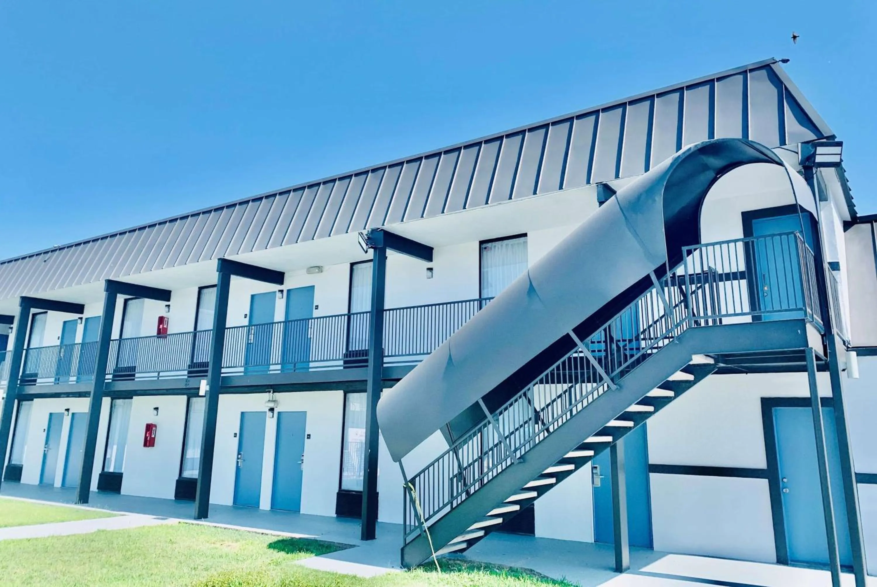 Property building in Days Inn by Wyndham Burleson Ft. Worth