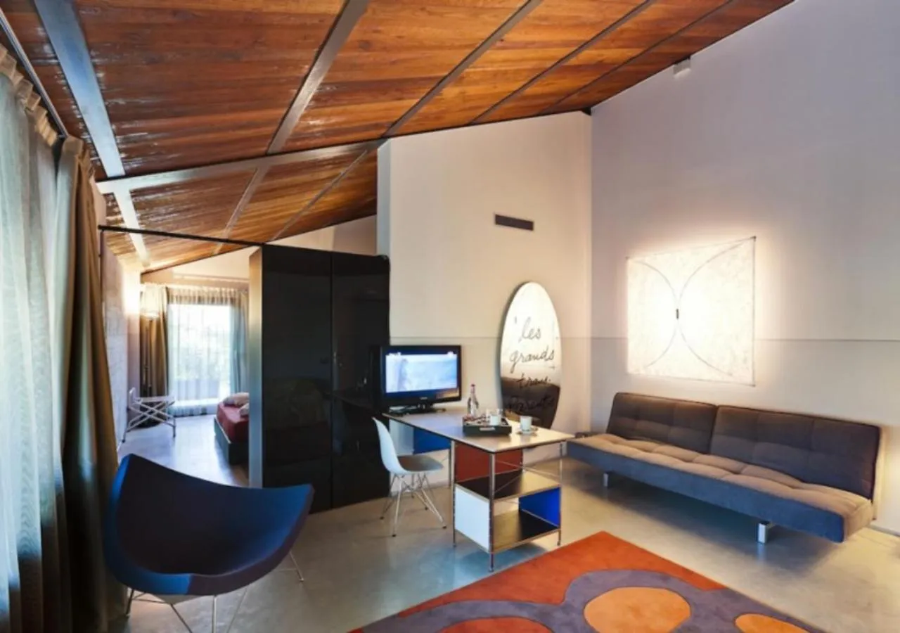 Living room, Bed in Il Tesoro Living Resort