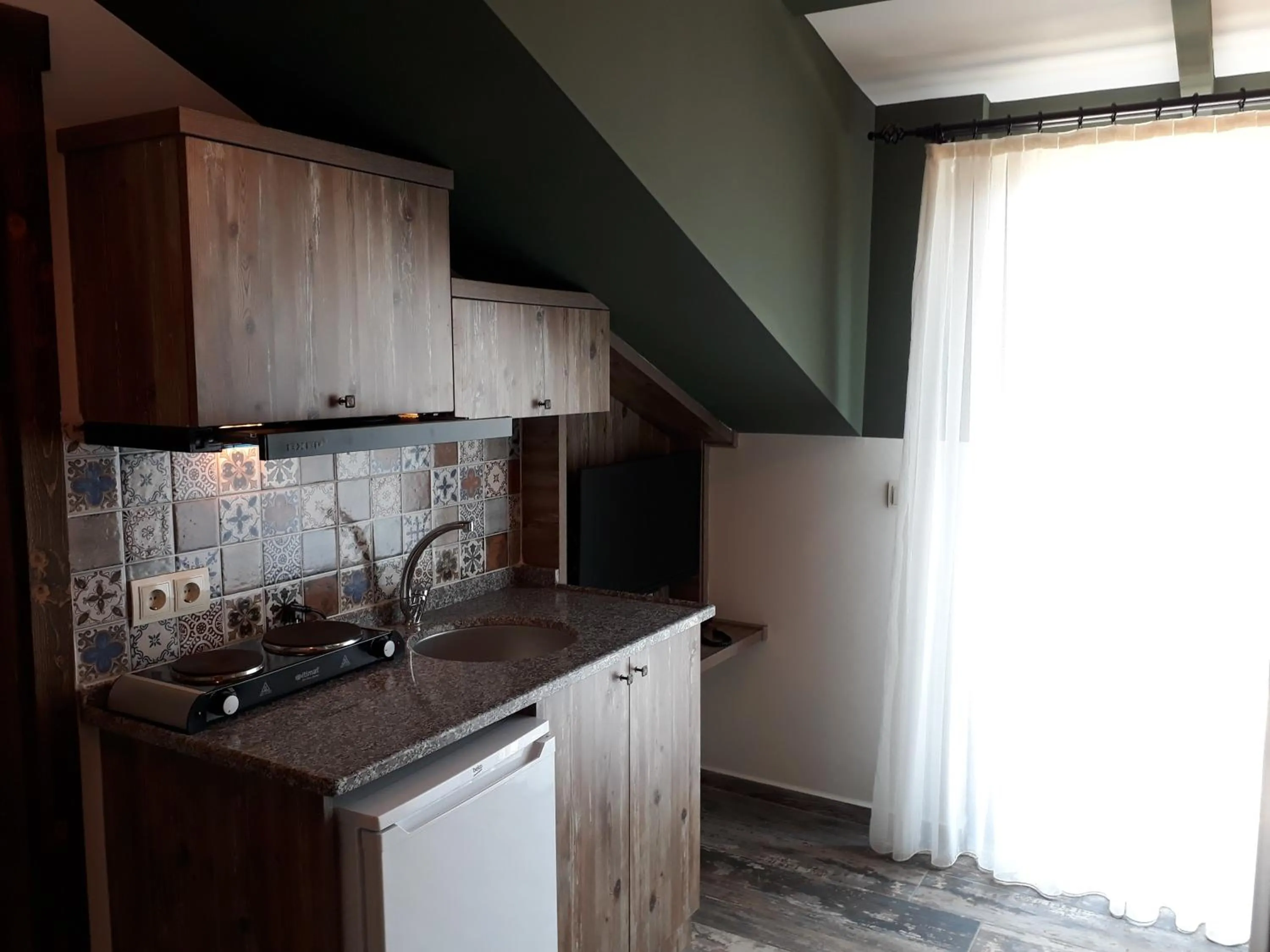 Kitchen or kitchenette in THE SARIGERME INN