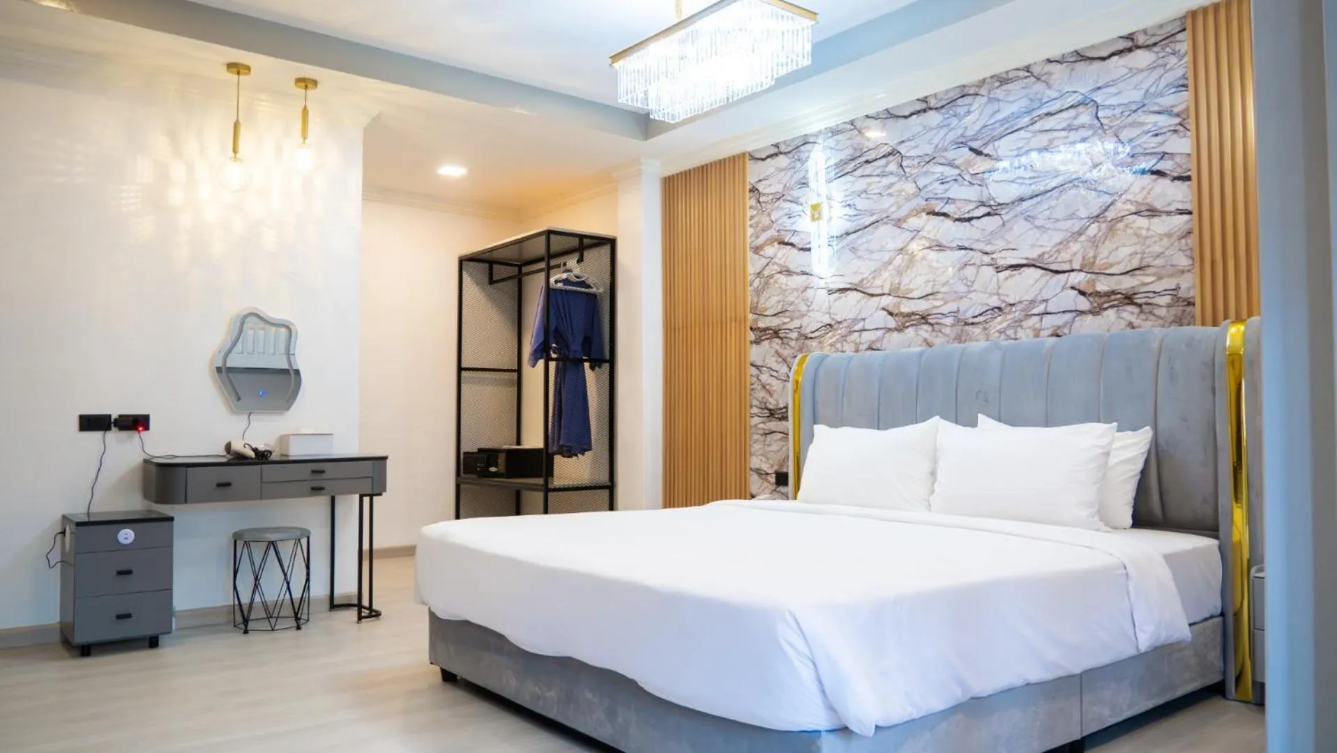 Bed in Baumanburi Hotel Patong