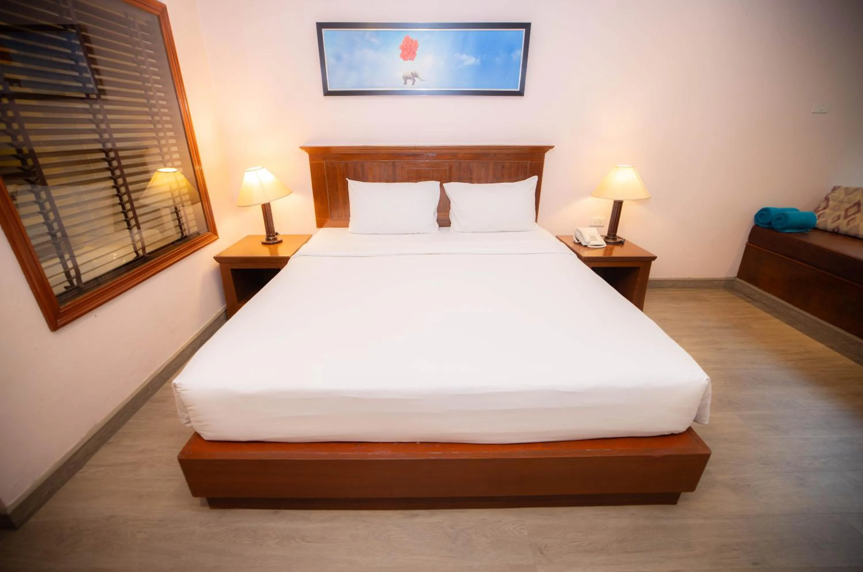 Bed in Baumanburi Hotel Patong