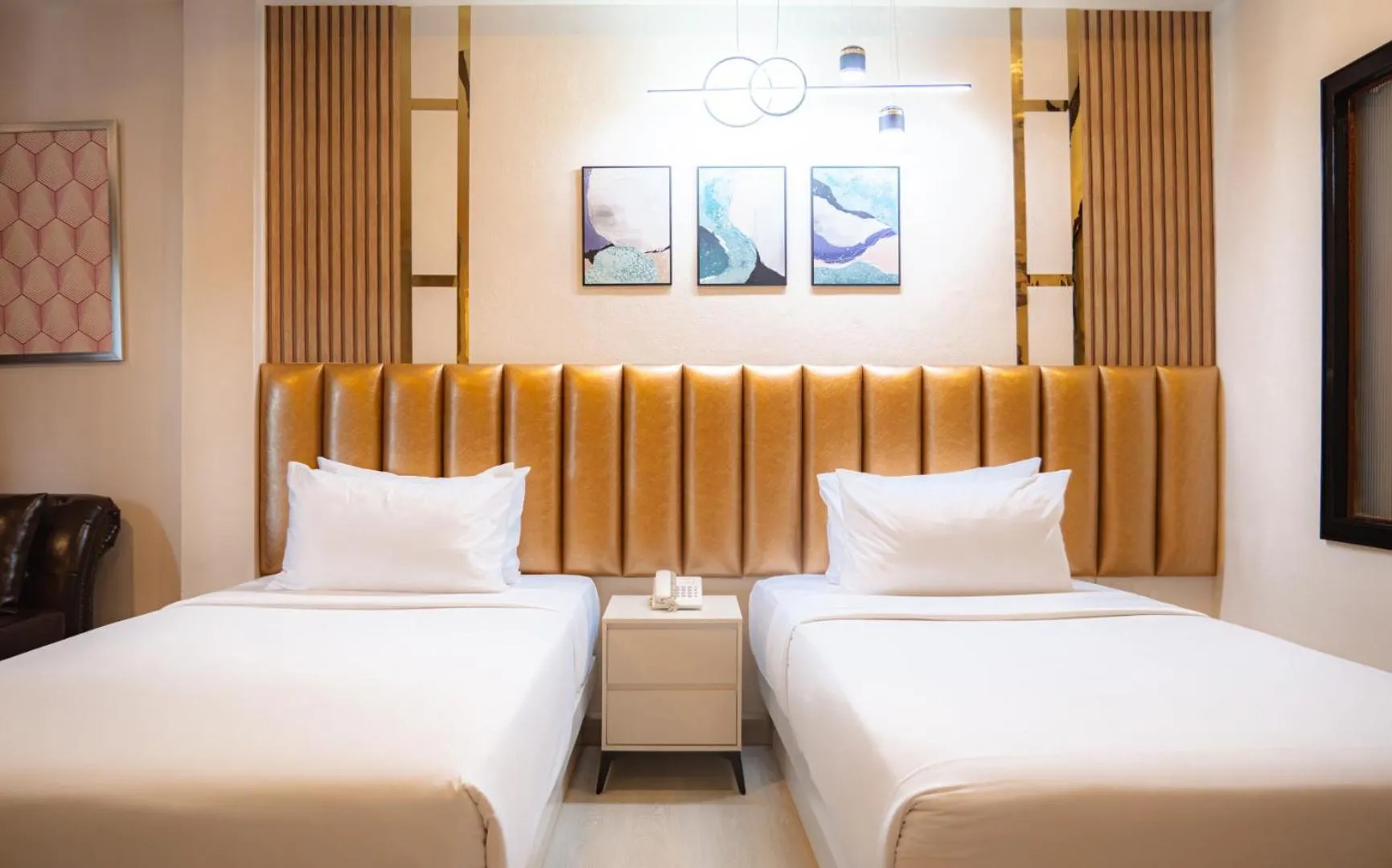 Bed in Baumanburi Hotel Patong