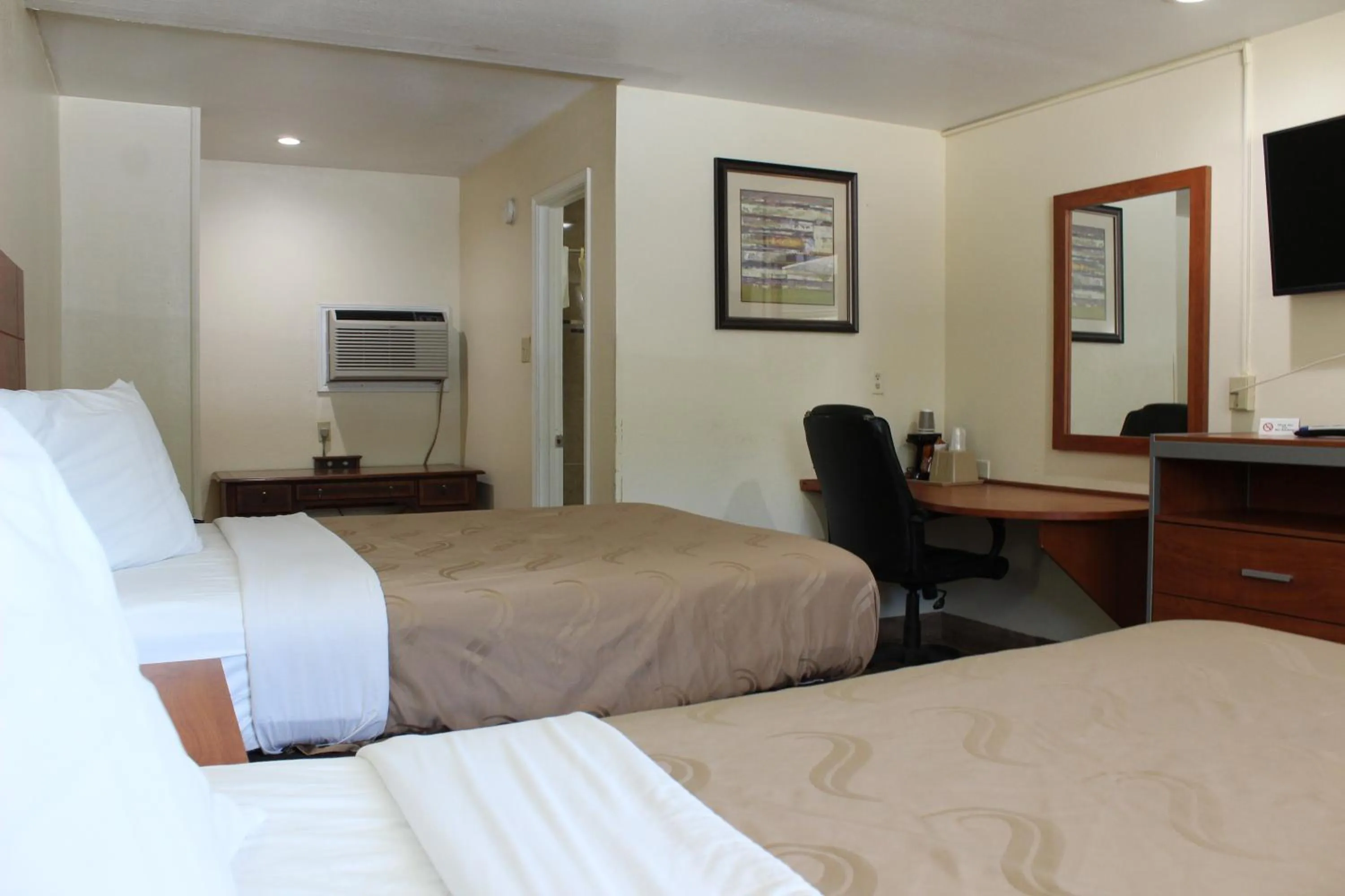 Bed in Evergreen Inn and R.V.