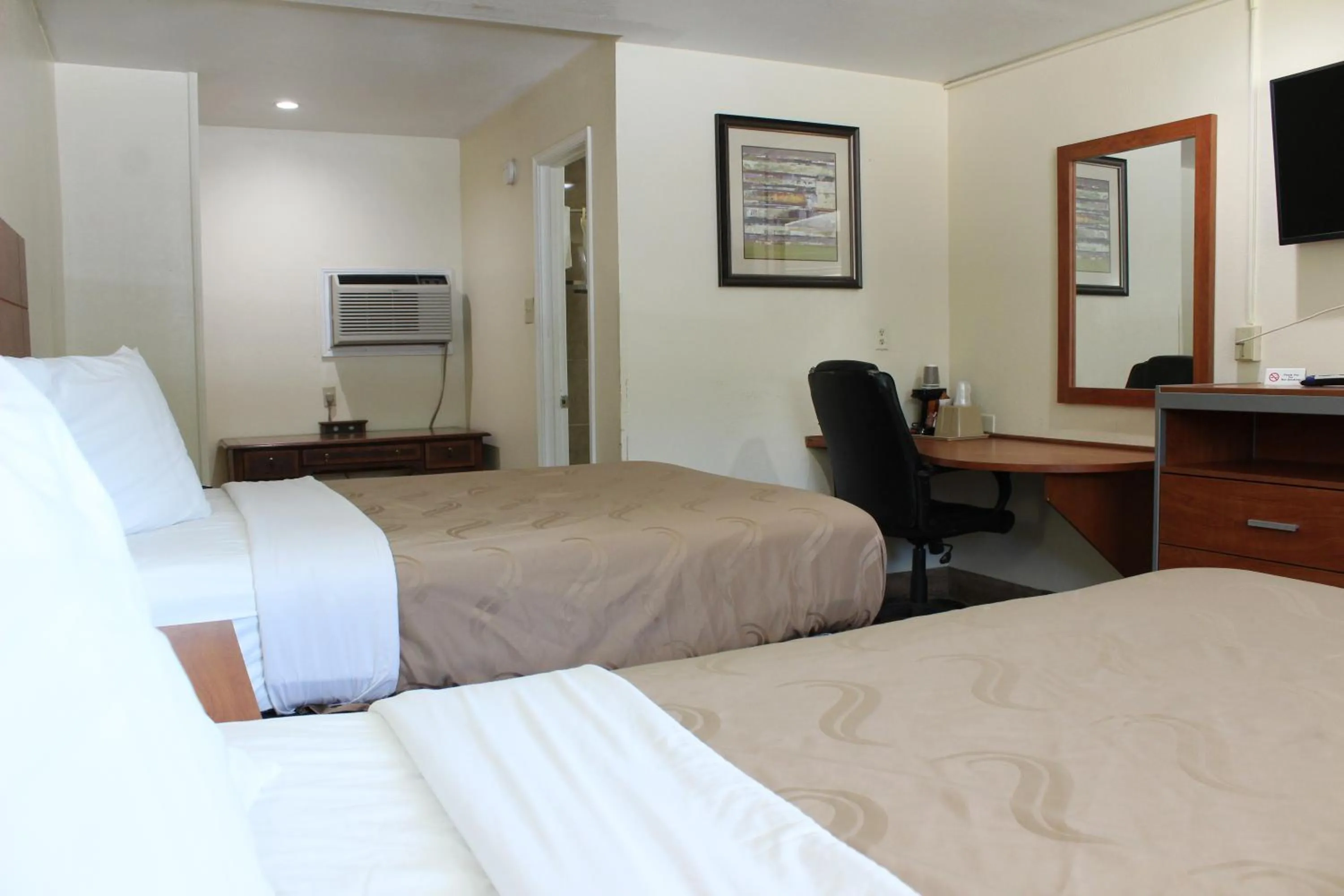 Bed in Evergreen Inn and R.V.