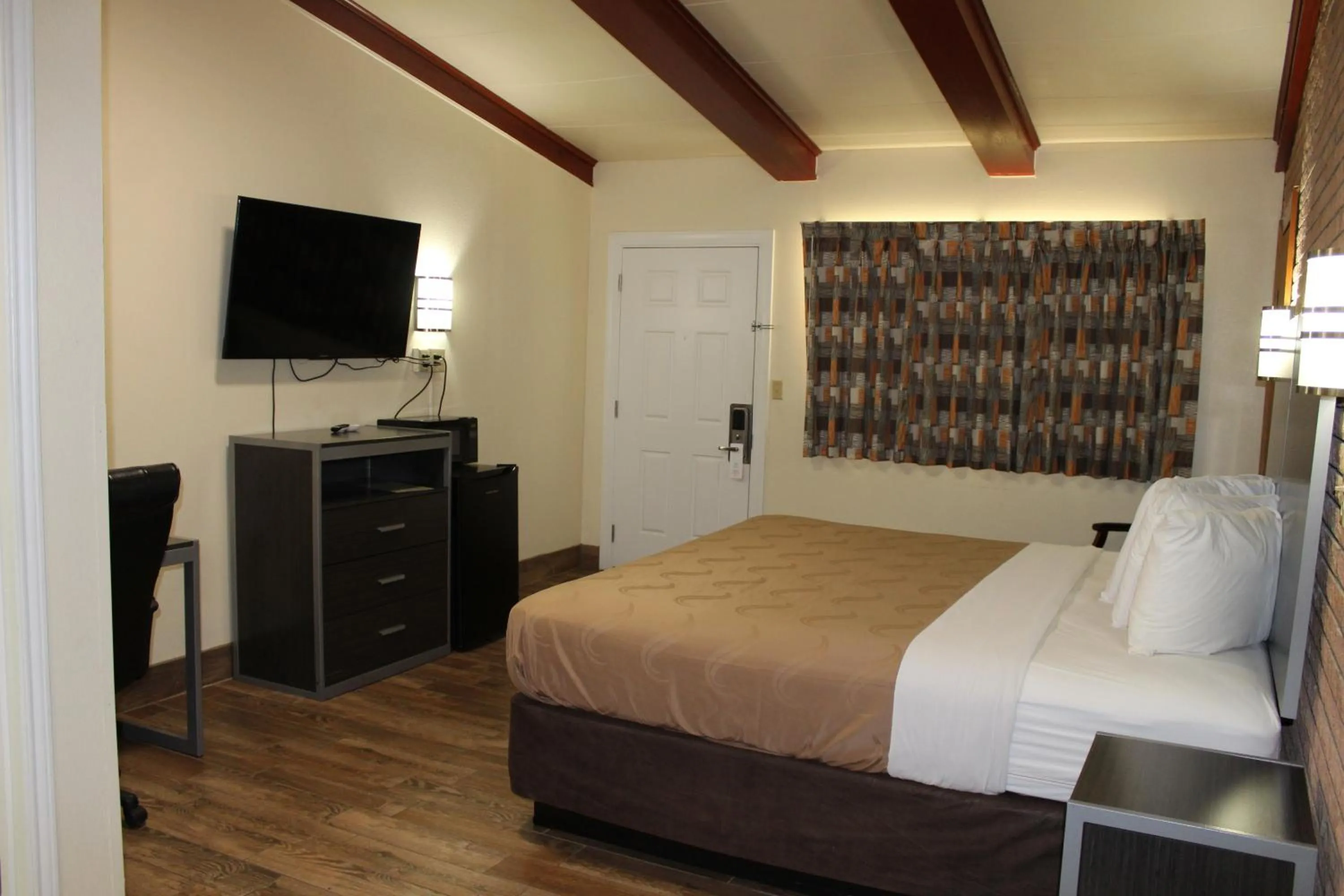 Bed in Evergreen Inn and R.V.