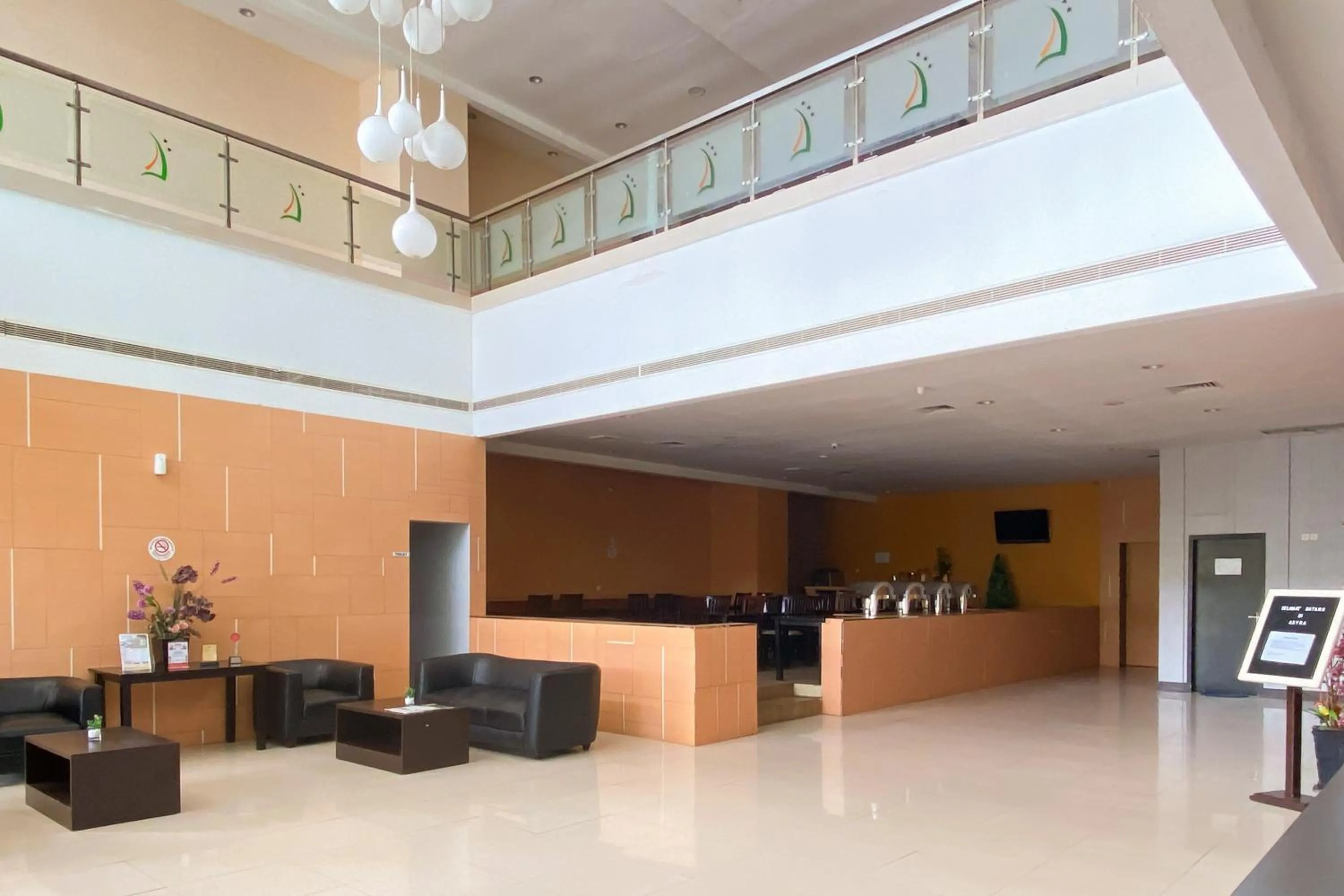 Seating area in Urbanview Hotel Asyra Makassar