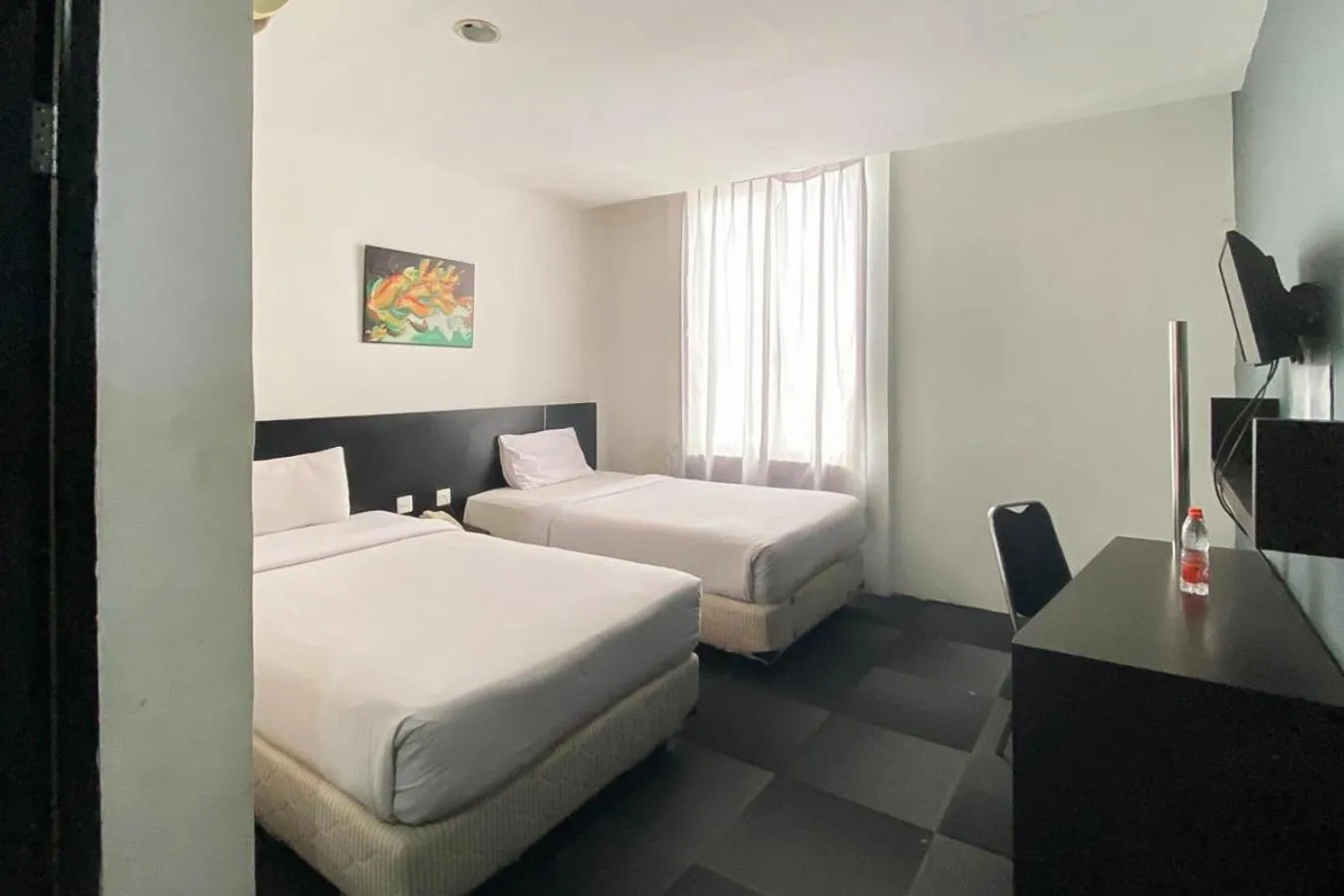 Bedroom, Bed in Urbanview Hotel Asyra Makassar