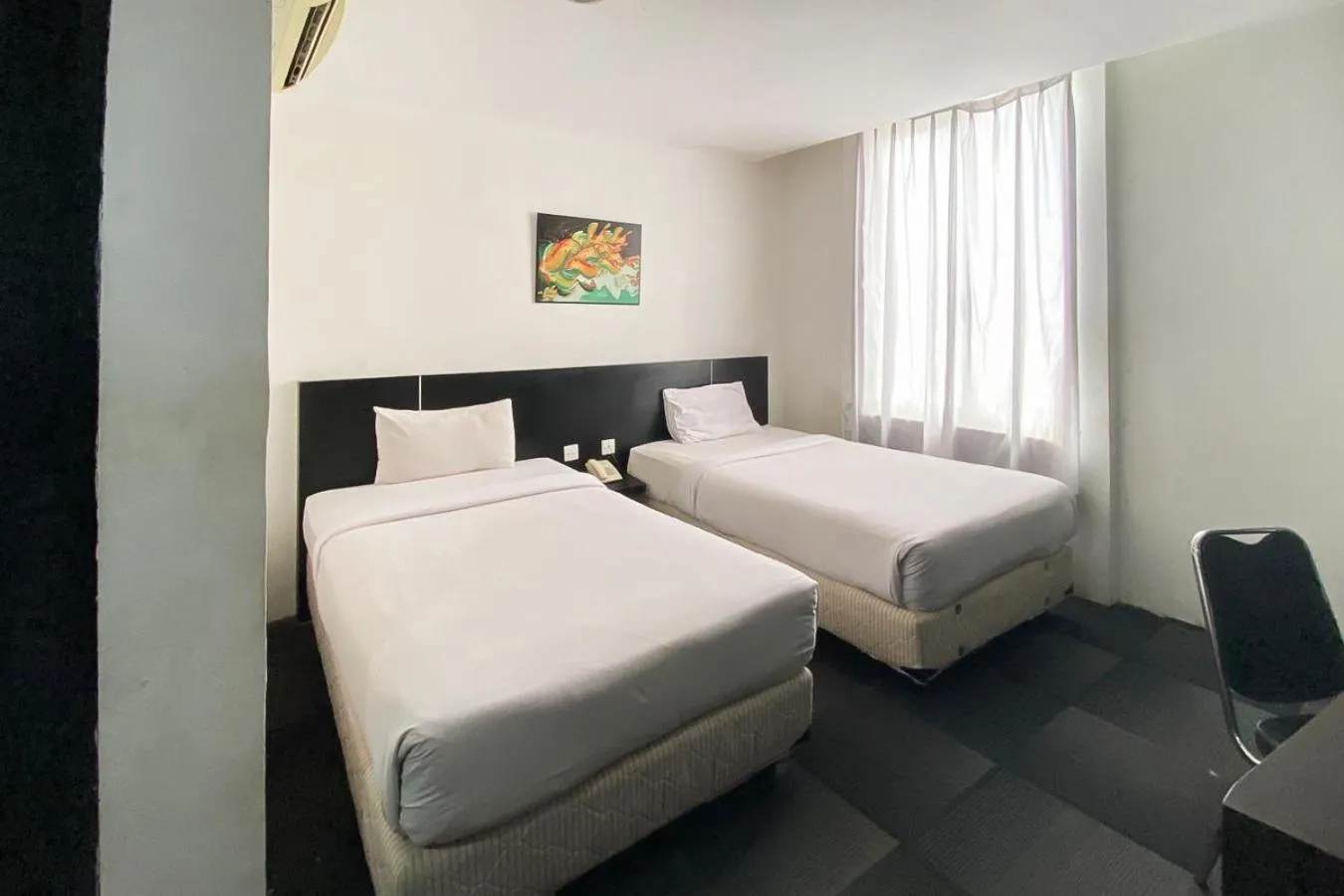 Bedroom, Bed in Urbanview Hotel Asyra Makassar
