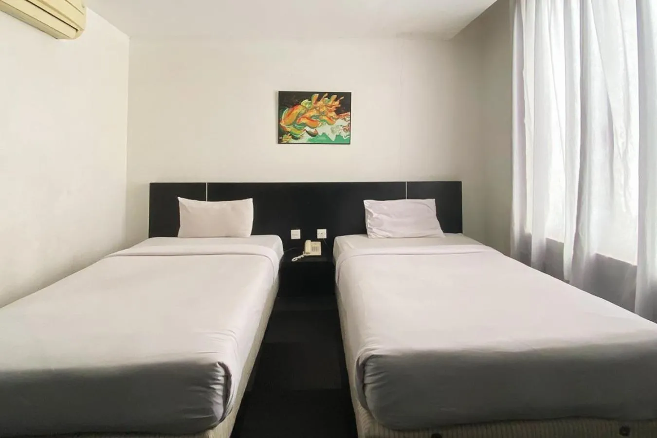 Bedroom, Bed in Urbanview Hotel Asyra Makassar