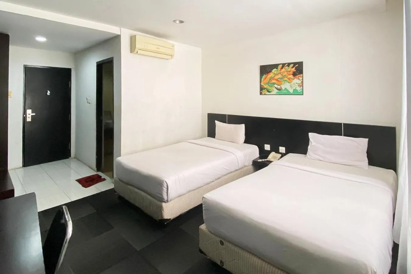 Bedroom, Bed in Urbanview Hotel Asyra Makassar