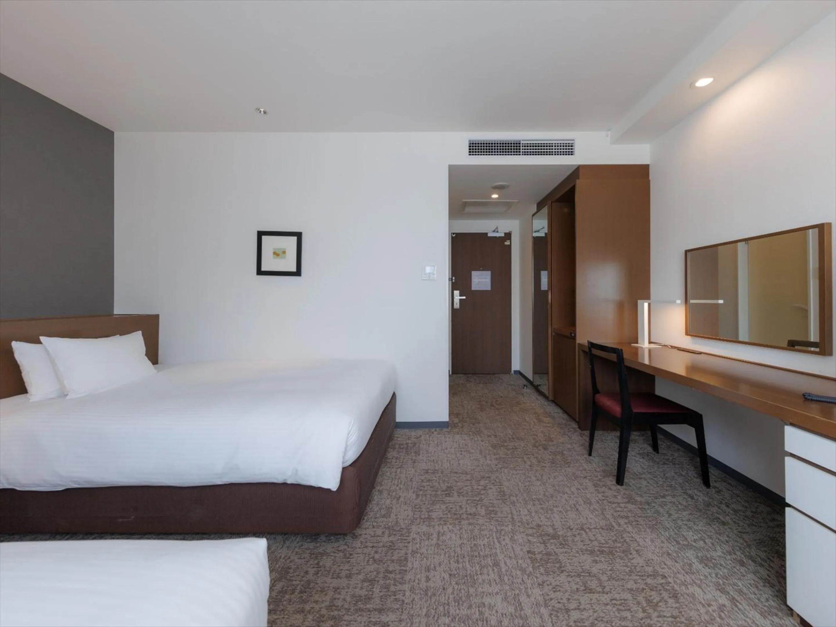 Photo of the whole room, Bed in JR Kyushu Hotel Kagoshima