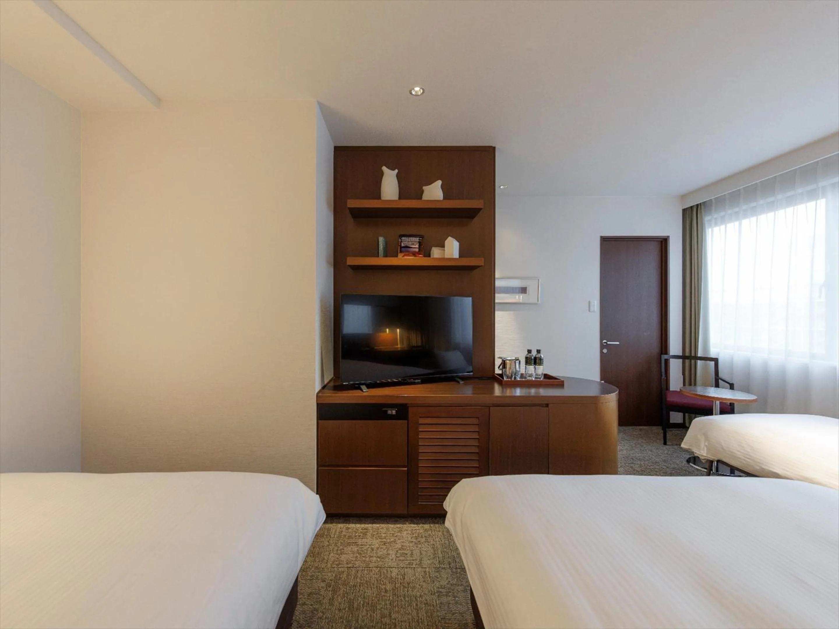 Photo of the whole room, Bed in JR Kyushu Hotel Kagoshima