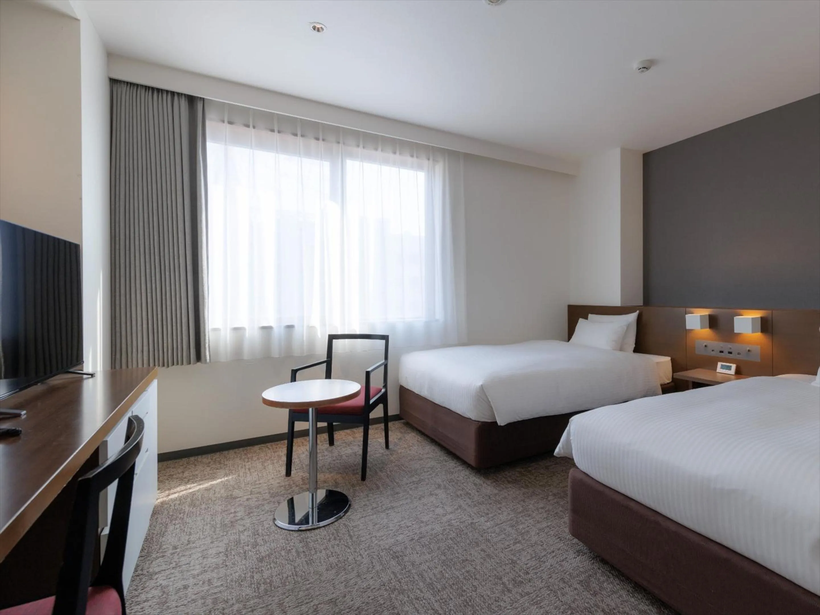 Photo of the whole room, Bed in JR Kyushu Hotel Kagoshima