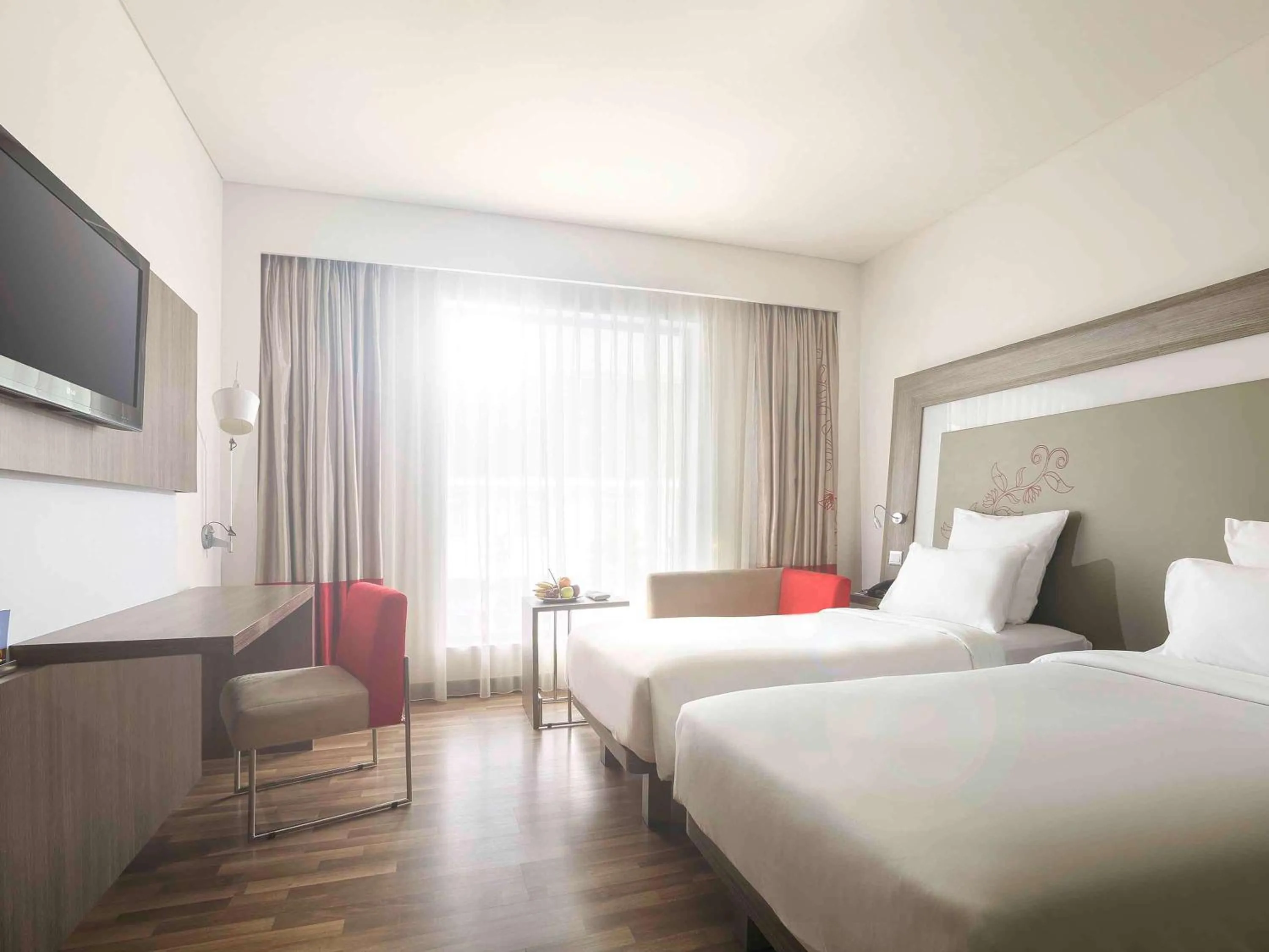 Photo of the whole room, Bed in Novotel Banjarmasin Airport
