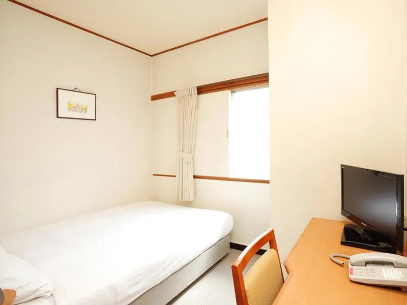 Bed in Smile Hotel Hachinohe