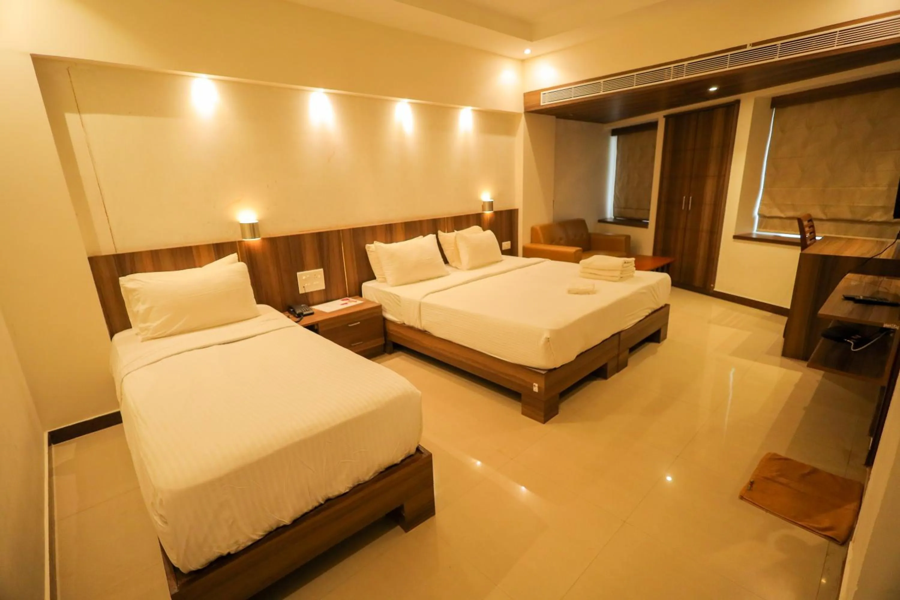 Bedroom, Bed in Metro Plaza Hotel by RAK Rooms, Mangaluru