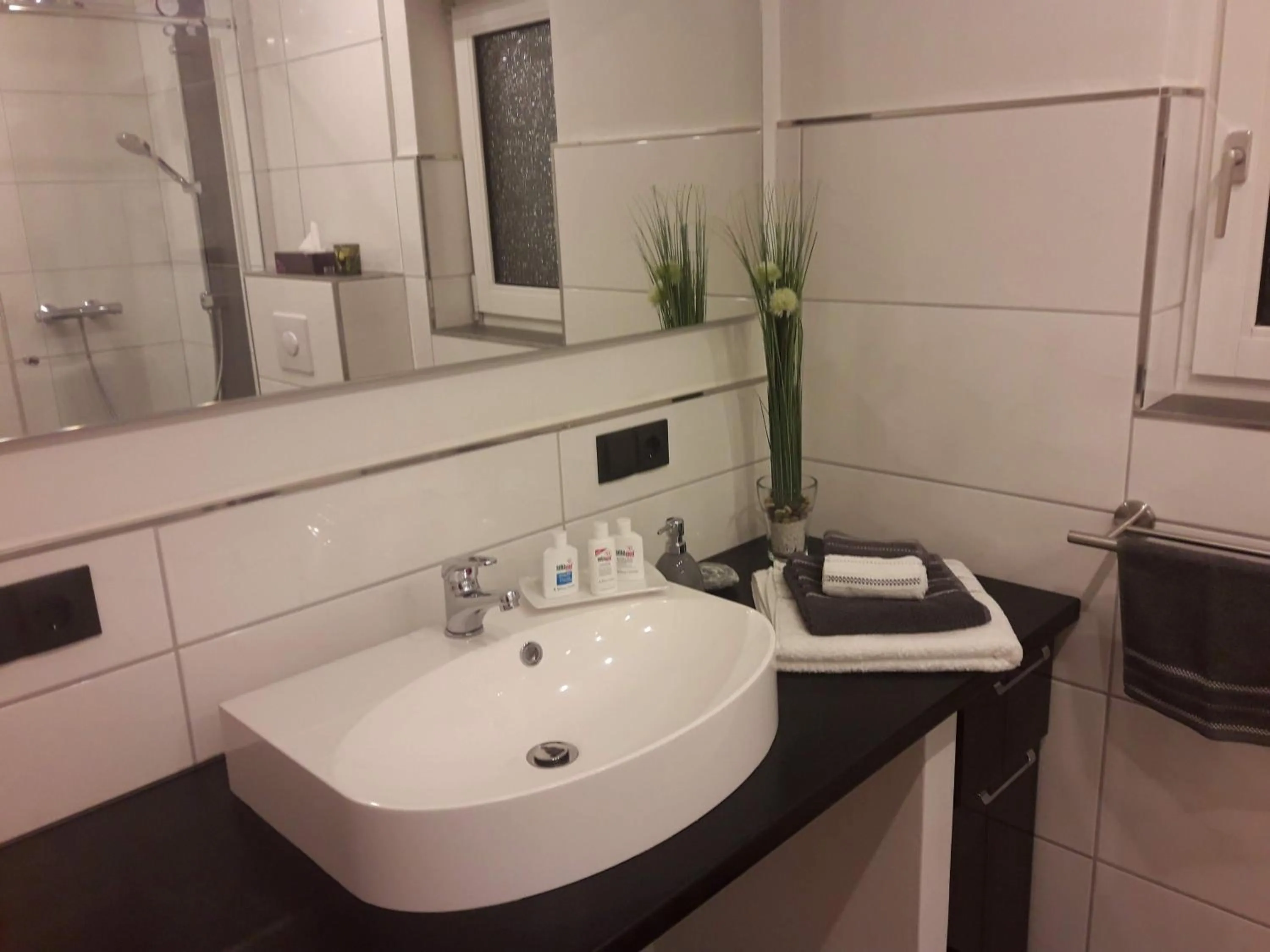 Bathroom in GÄSTEHAUS LIFESTYLE