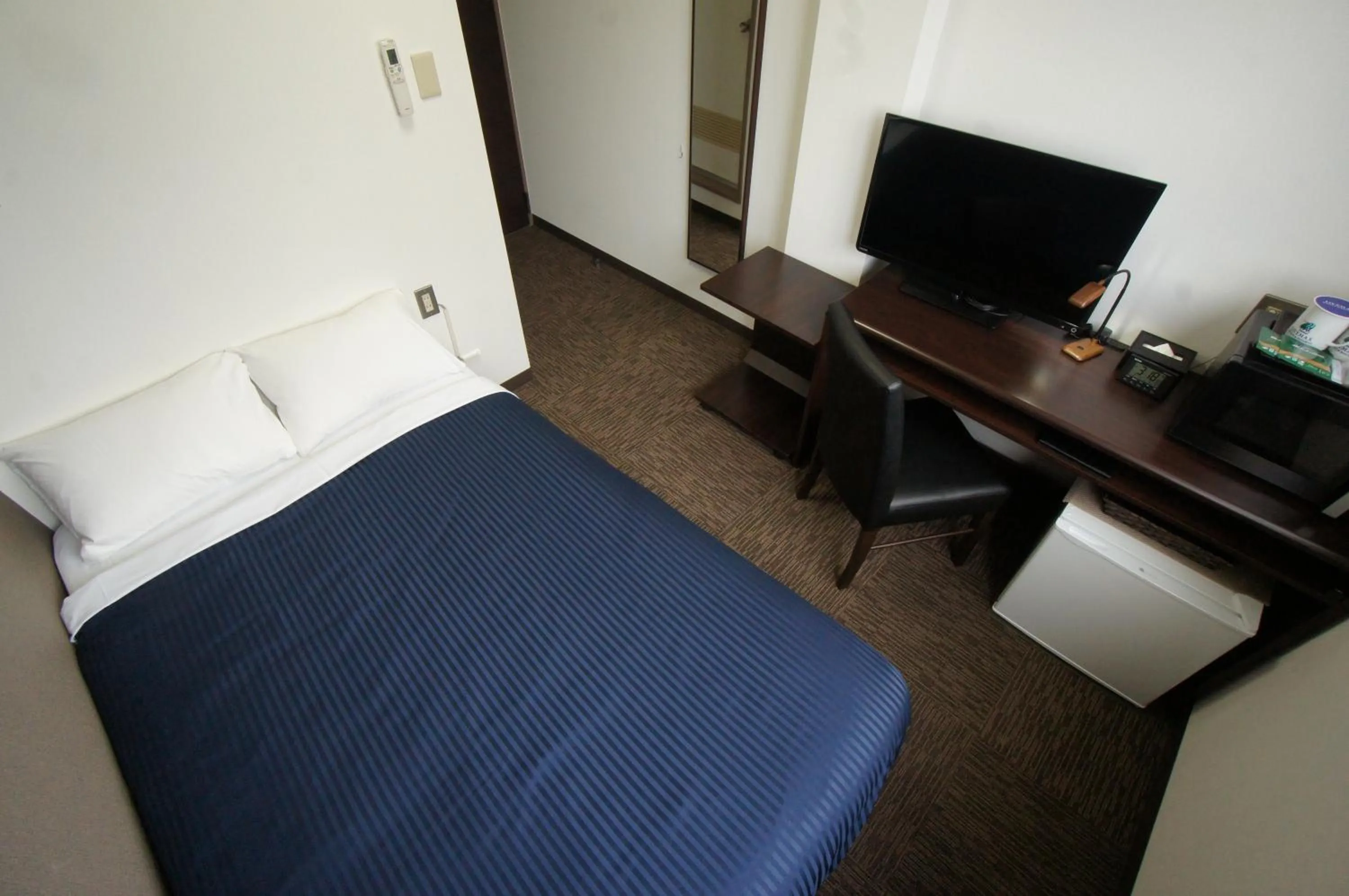 Communal lounge/ TV room, Bed in HOTEL LiVEMAX BUDGET Gunma Numata