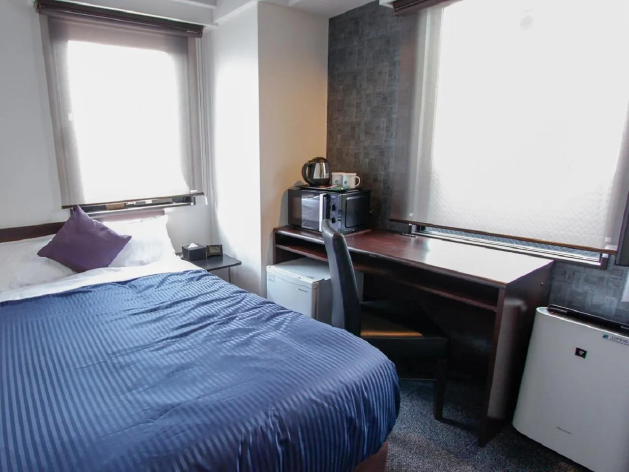 Bed in HOTEL LiVEMAX Kobe Sannomiya